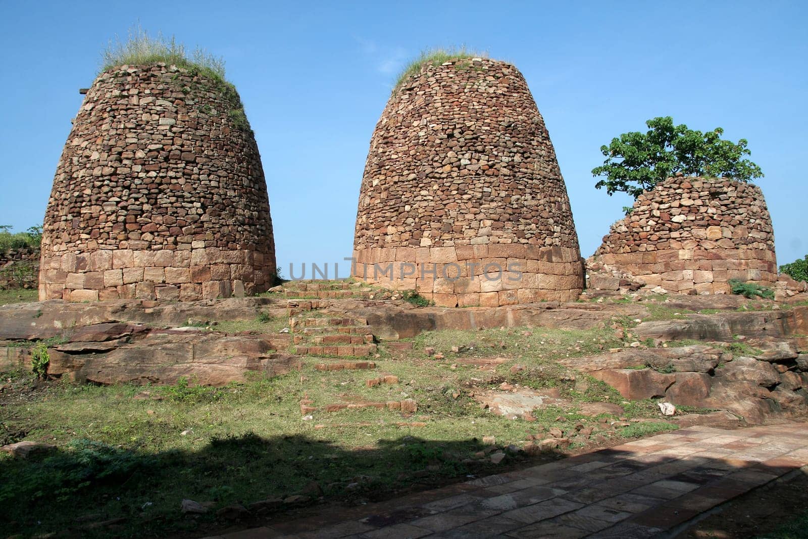 Three dressed stone watch towers for observation by guards inside fort in Badami, Karnataka, India, Asia
