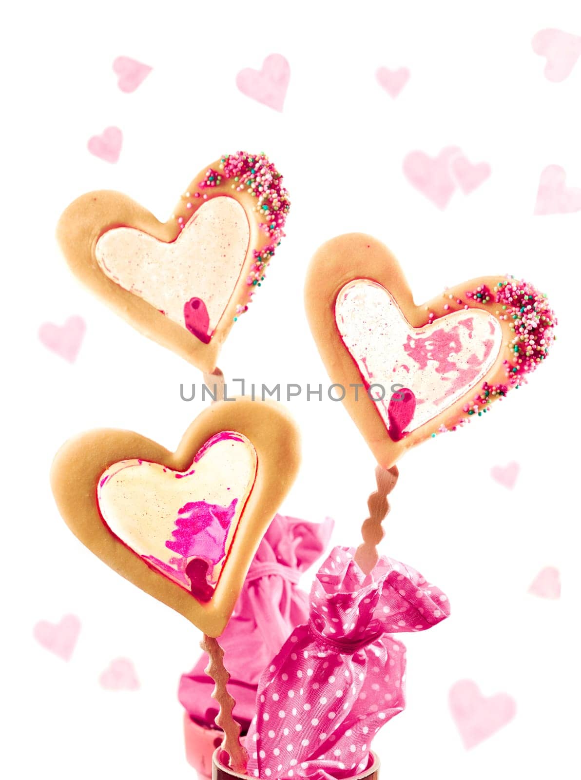 three cookies on a stick with caramell filling maybe for valentine as a card