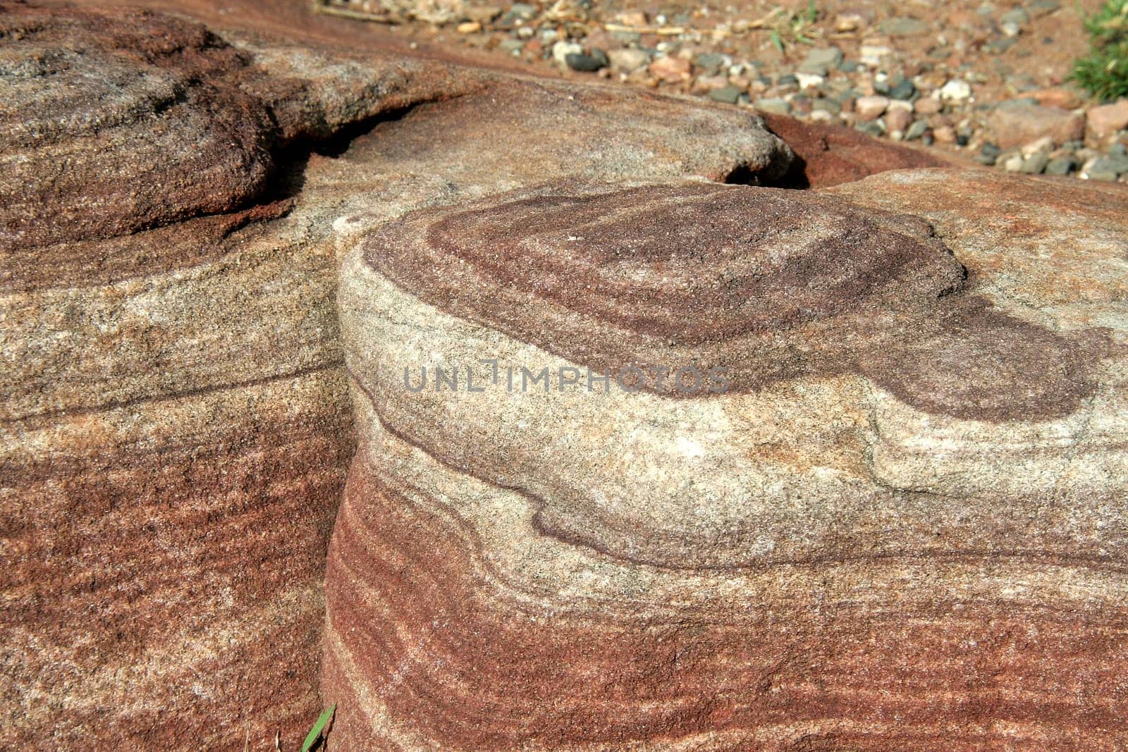 Colouful and layered grain flow pattern in rocks