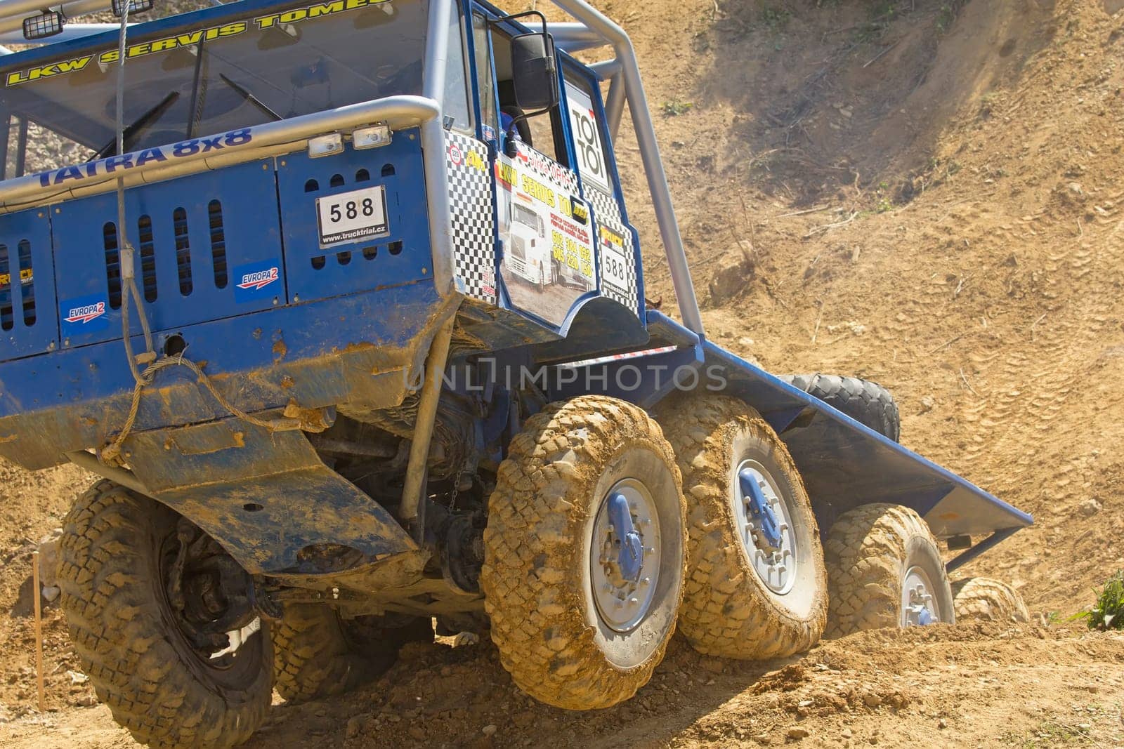 MOHELNICE, CZECH REPUBLIC - MAY 20. Unidentified racer at blue truck  passes through difficult terrain in the "Grand Prix Truck Trial 2012"" on May 20, 2012 in the town of Mohelnice, Czech Republic."