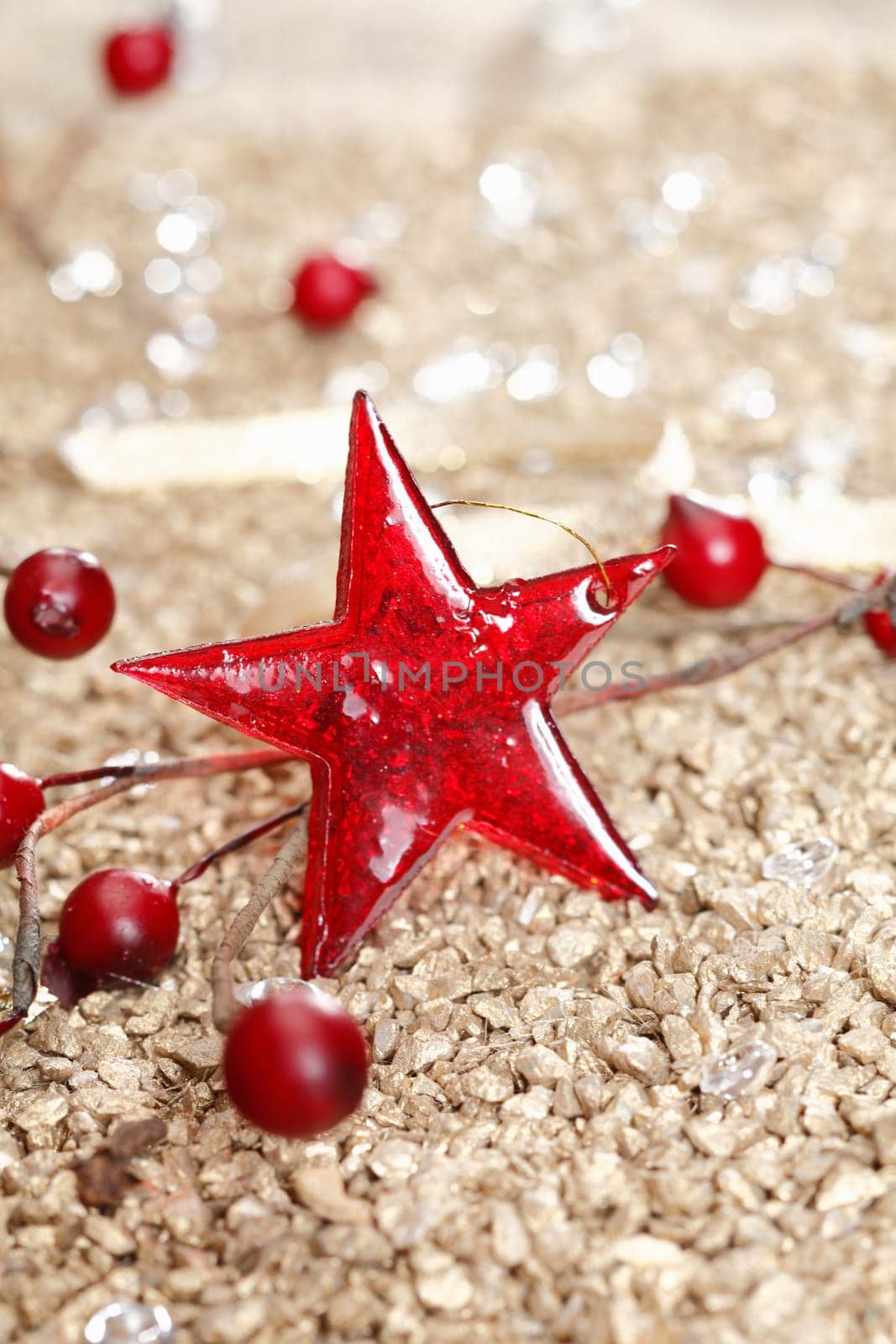 Single Christmas star and some other decorative elements on a golden background