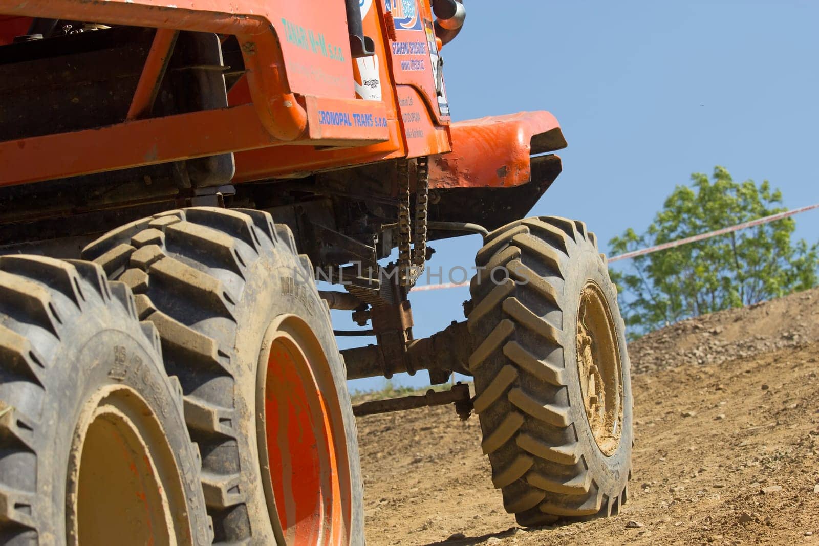 MOHELNICE, CZECH REPUBLIC - MAY 20. Detailed view of orange truck at difficult terrain in the "Grand Prix Truck Trial 2012"" on May 20, 2012 in the town of Mohelnice, Czech Republic."