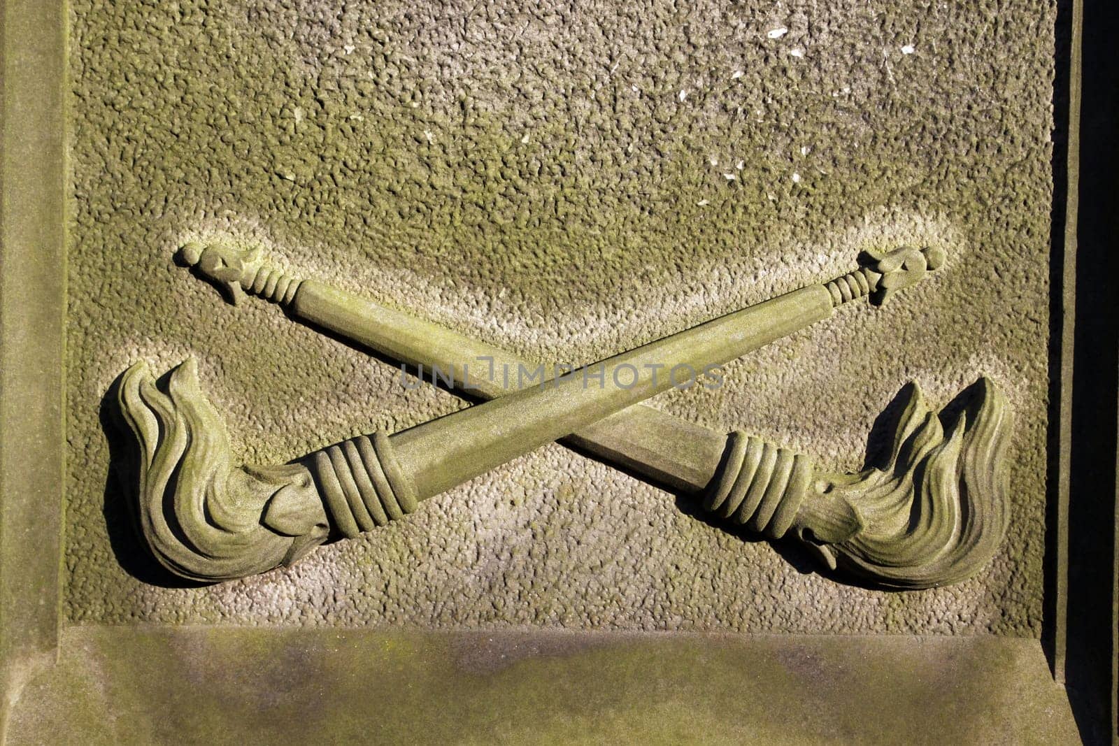 Torches on a gravestone (Hamelin Cemetery)