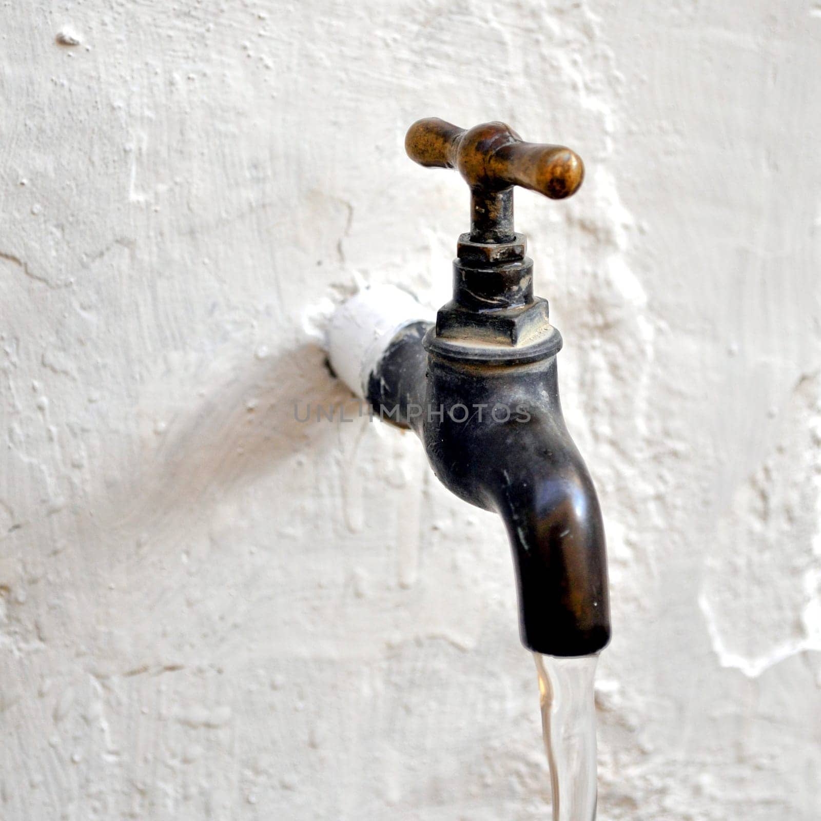 Detail of a water tap valve faucet spigot