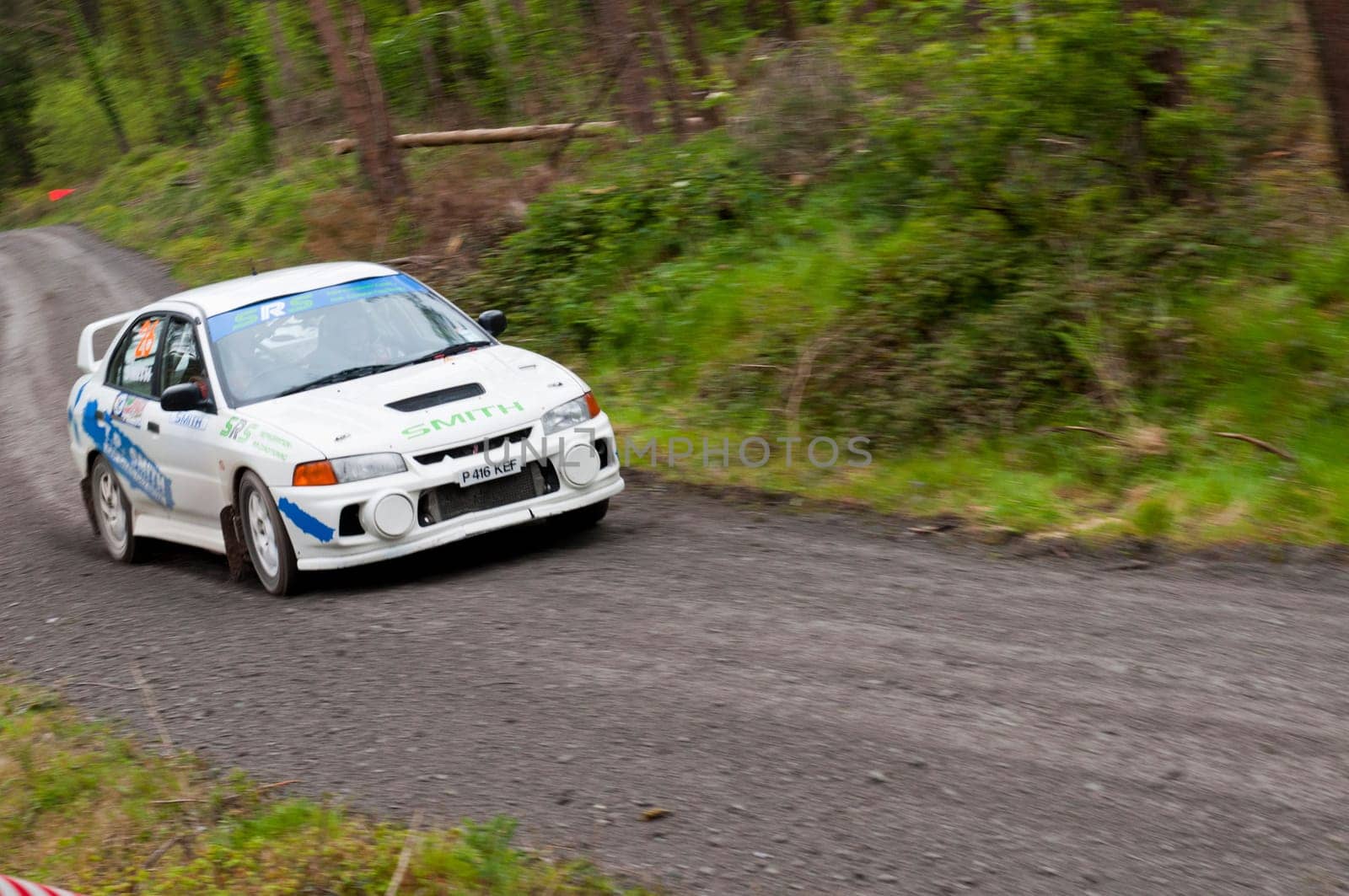 MALLOW, IRELAND - MAY 19: D. Smith driving Mitsubishi Evo at the Jim Walsh Cork Forest Rally on May 19, 2012 in Mallow, Ireland. 4th round of the Valvoline National Forest Rally Championship.