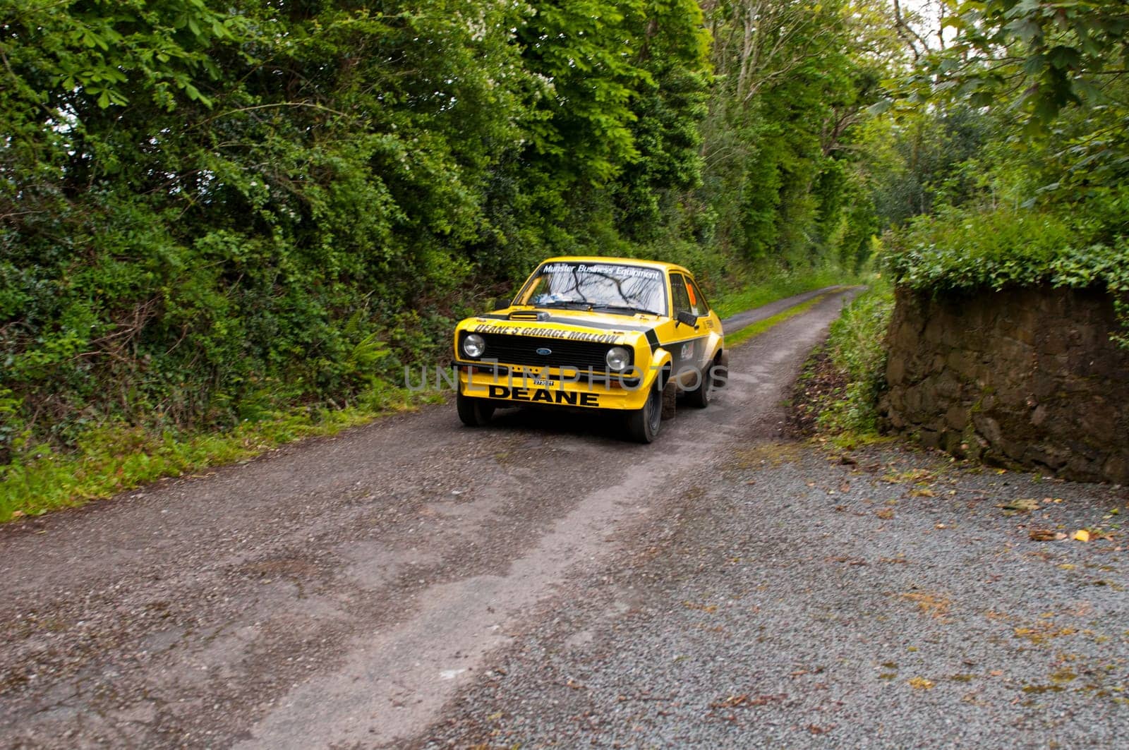 MALLOW, IRELAND - MAY 19: J. Deane driving Ford Escort at the Jim Walsh Cork Forest Rally on May 19, 2012 in Mallow, Ireland. 4th round of the Valvoline National Forest Rally Championship.