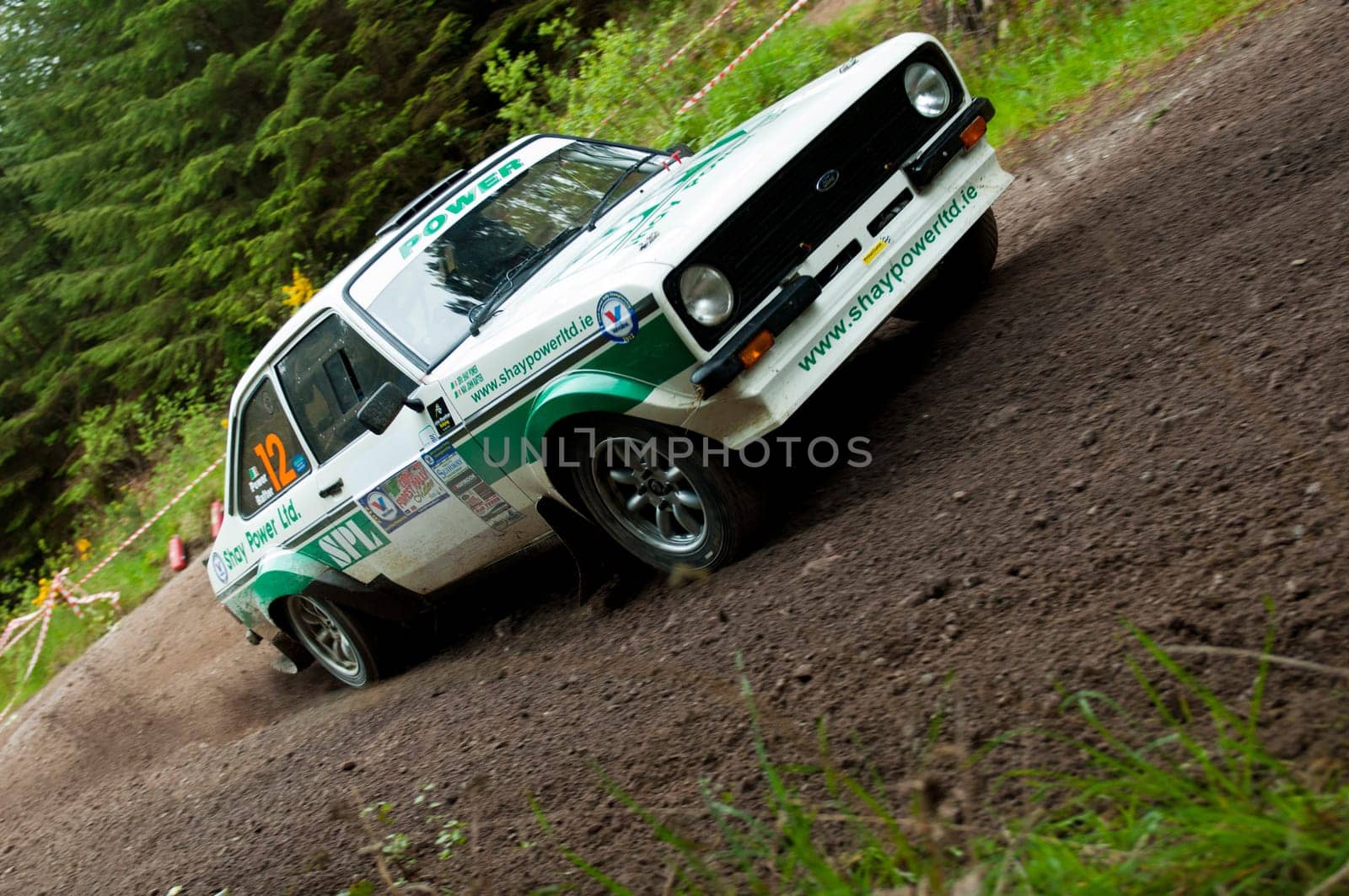 MALLOW, IRELAND - MAY 19: S. Power problems on Ford Escort at the Jim Walsh Cork Forest Rally on May 19, 2012 in Mallow, Ireland. 4th round of the Valvoline National Forest Rally Championship.