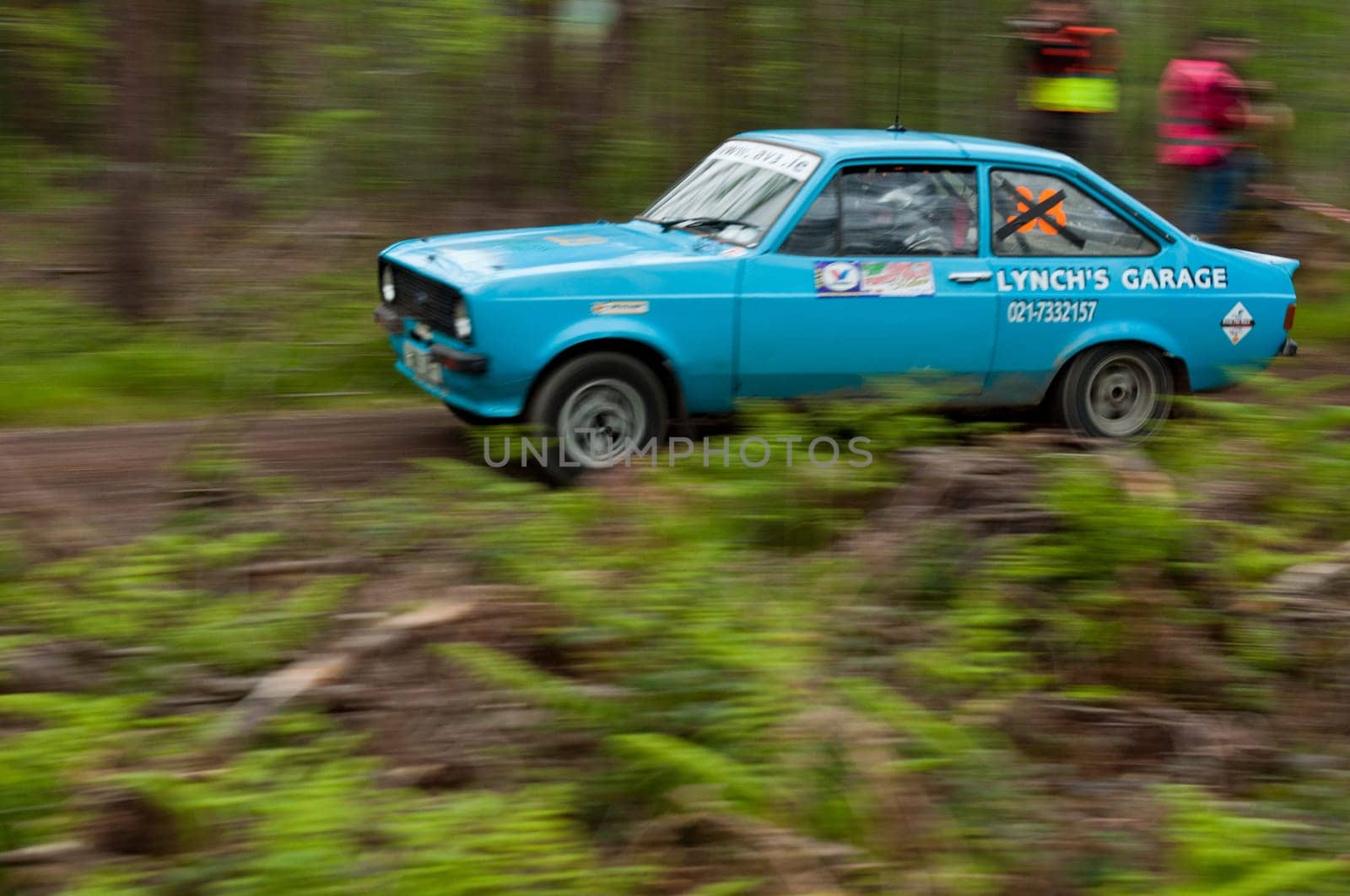 MALLOW, IRELAND - MAY 19: L. Lynch driving Ford Escort at the Jim Walsh Cork Forest Rally on May 19, 2012 in Mallow, Ireland. 4th round of the Valvoline National Forest Rally Championship.