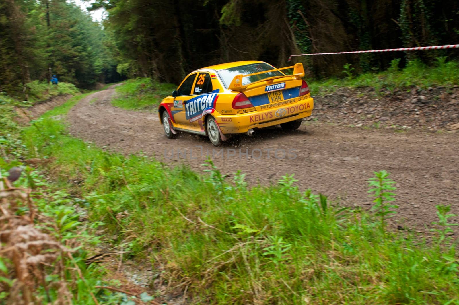 MALLOW, IRELAND - MAY 19: P. Barrett driving Mitsubishi Evo at the Jim Walsh Cork Forest Rally on May 19, 2012 in Mallow, Ireland. 4th round of the Valvoline National Forest Rally Championship.