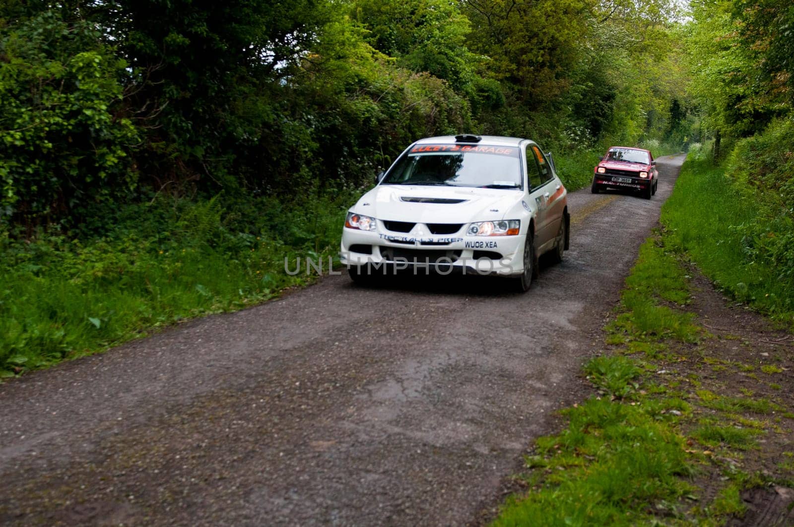 MALLOW, IRELAND - MAY 19: G. Lucey driving Mitsubishi Evo at the Jim Walsh Cork Forest Rally on May 19, 2012 in Mallow, Ireland. 4th round of the Valvoline National Forest Rally Championship.