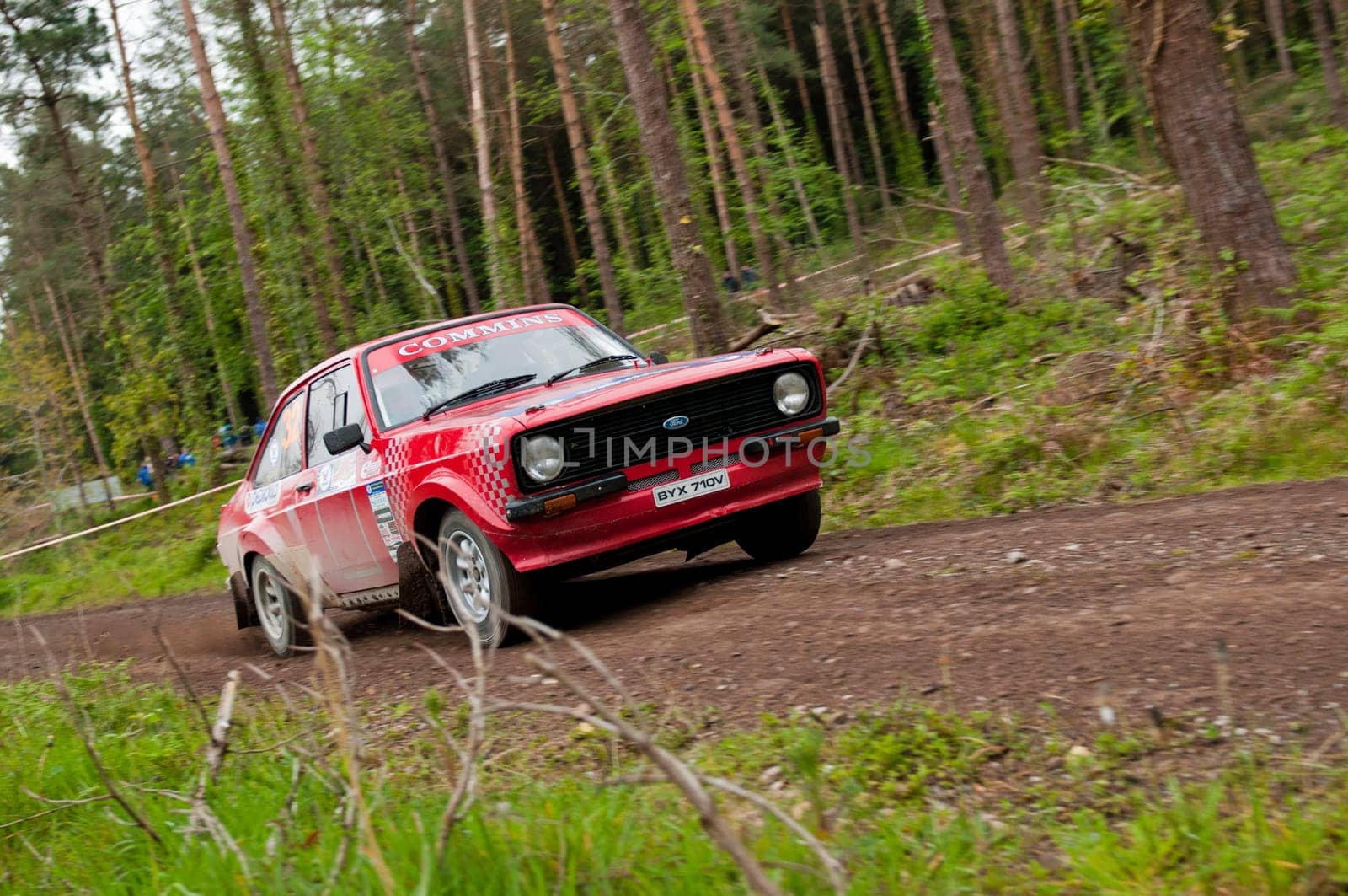 MALLOW, IRELAND - MAY 19: A. Commins driving Ford Escort at the Jim Walsh Cork Forest Rally on May 19, 2012 in Mallow, Ireland. 4th round of the Valvoline National Forest Rally Championship.