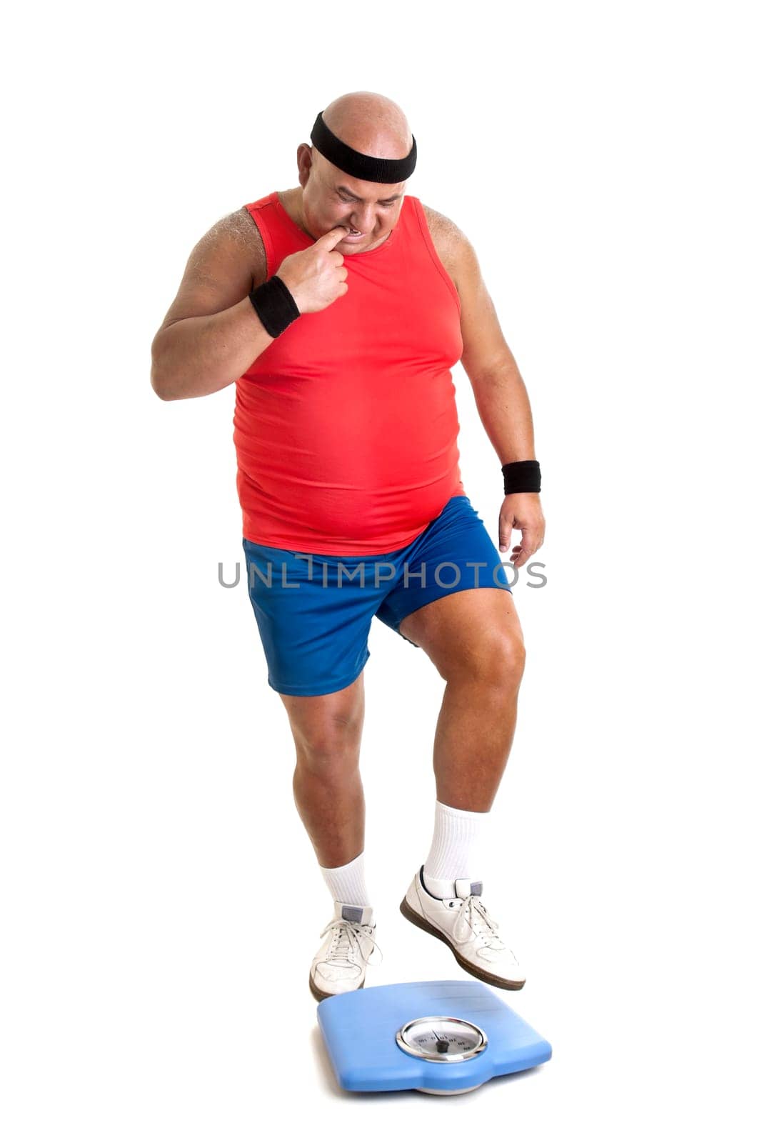 Large fitness man with weight scale isolated in white
