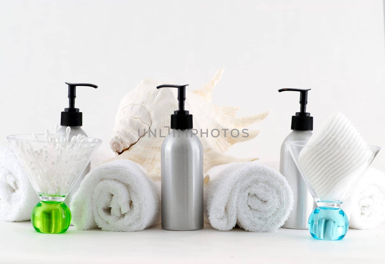Various professional spa products arranged on a white background