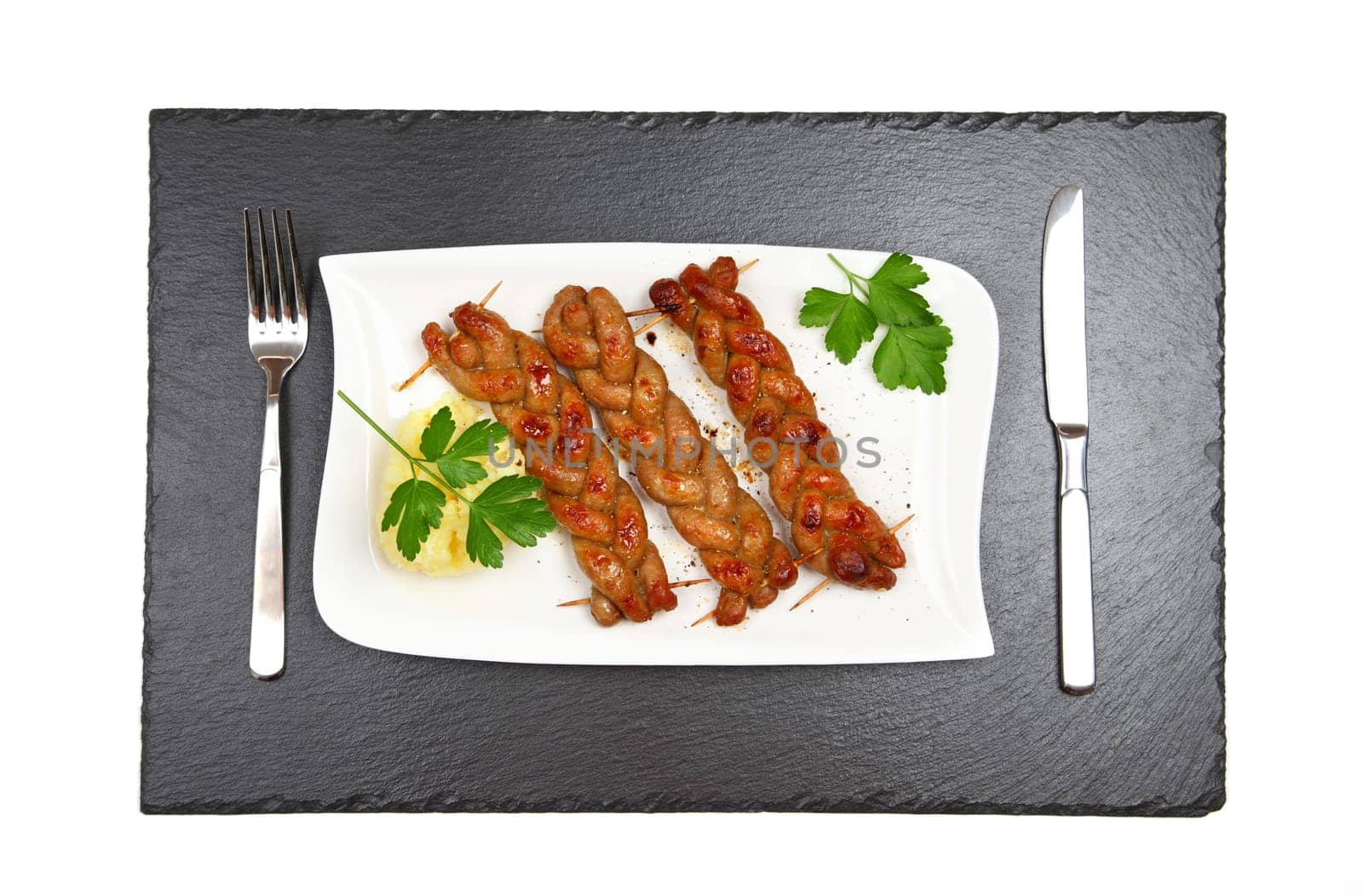 Bratwurst - fried sausage with mashed potatoes - top view