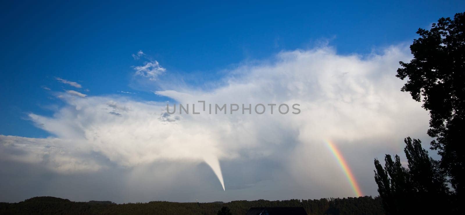 Tornado and rainbow