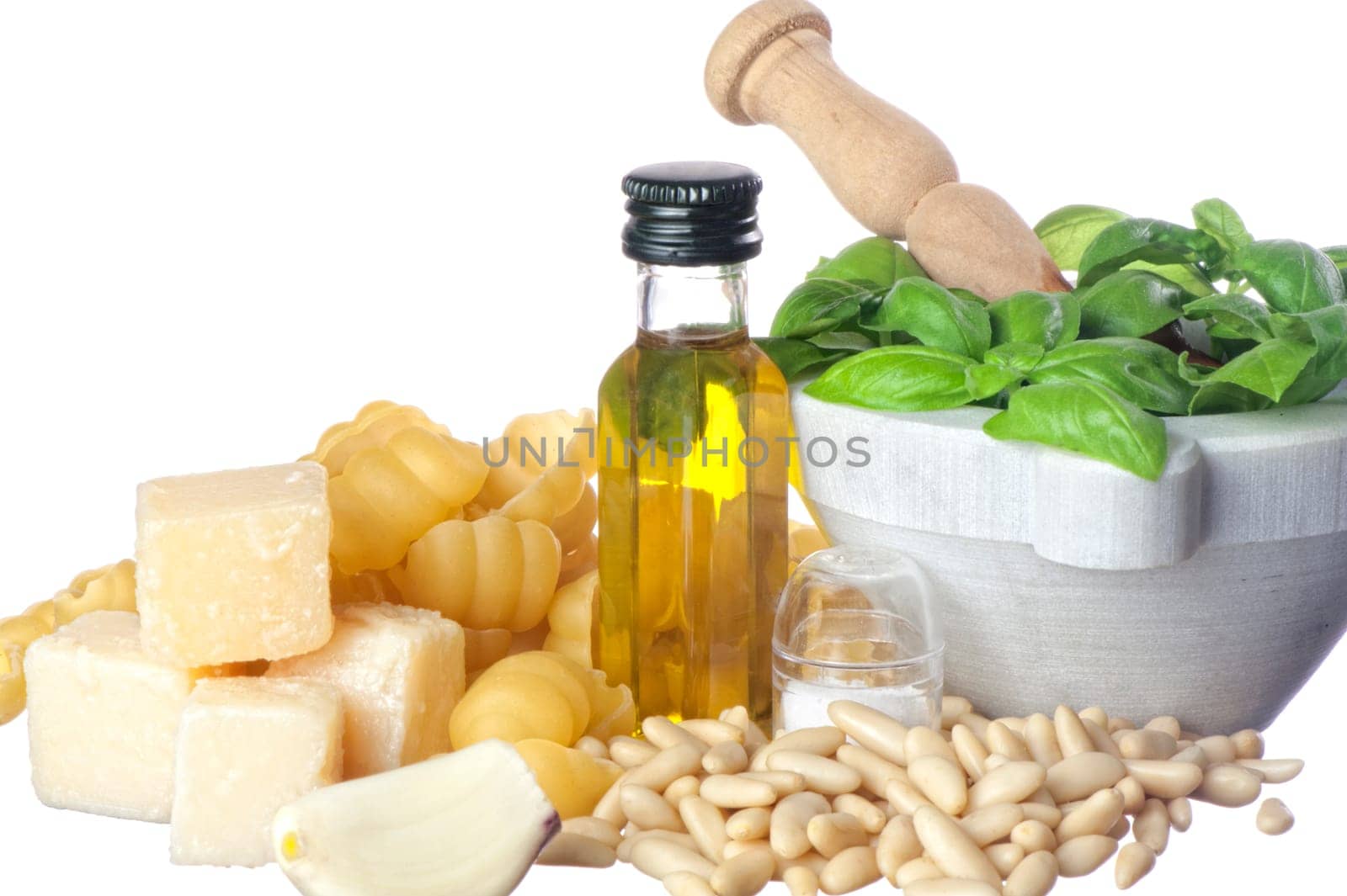 ingredients for seasoning of Italian pasta on white background