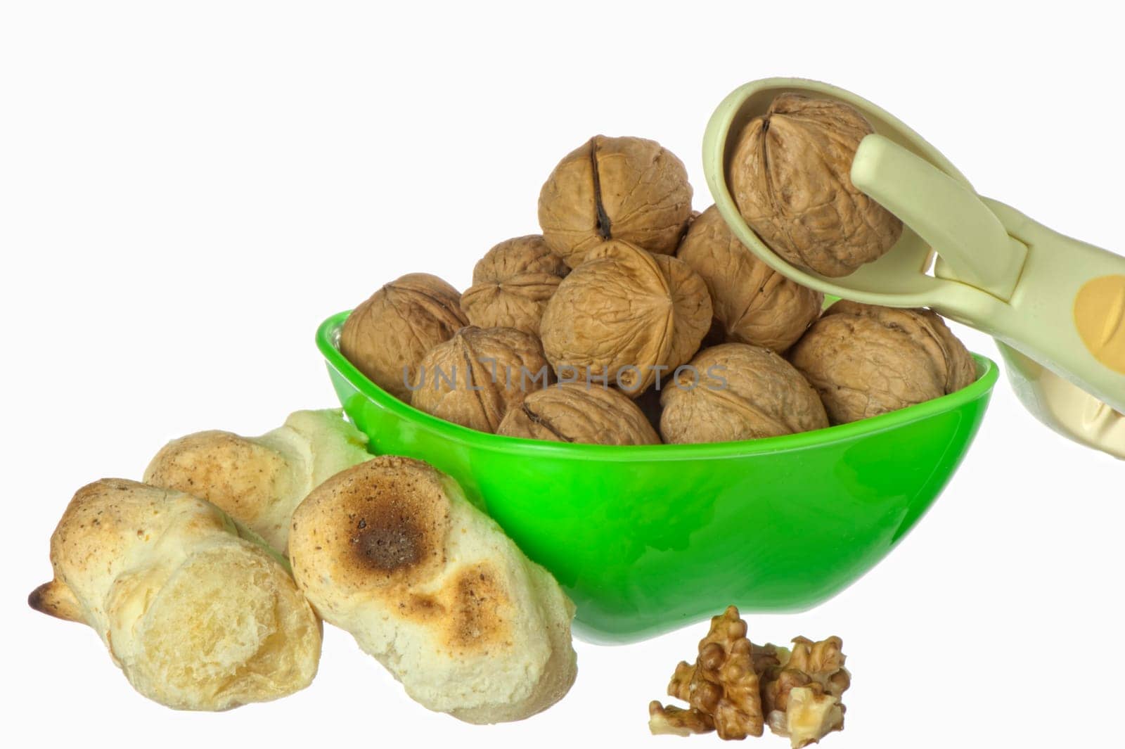 yucca bread and nuts on white background