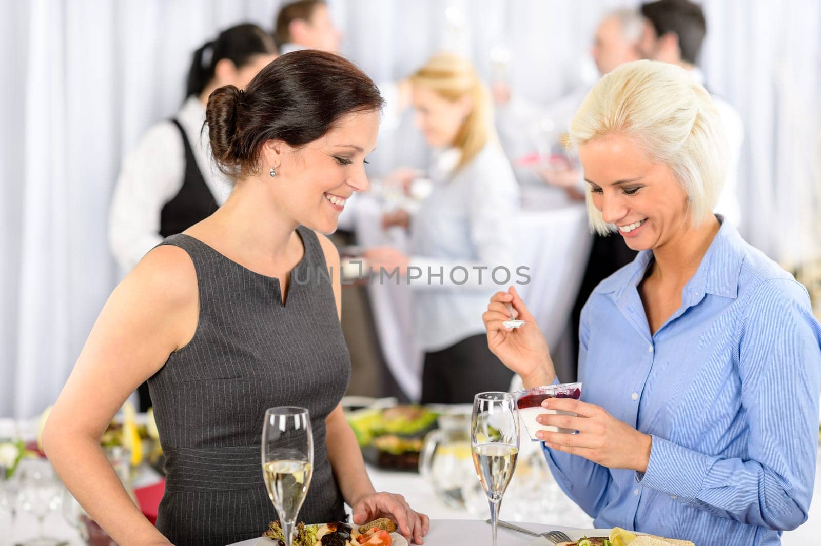 Business meeting buffet smiling woman eat dessert formal company event