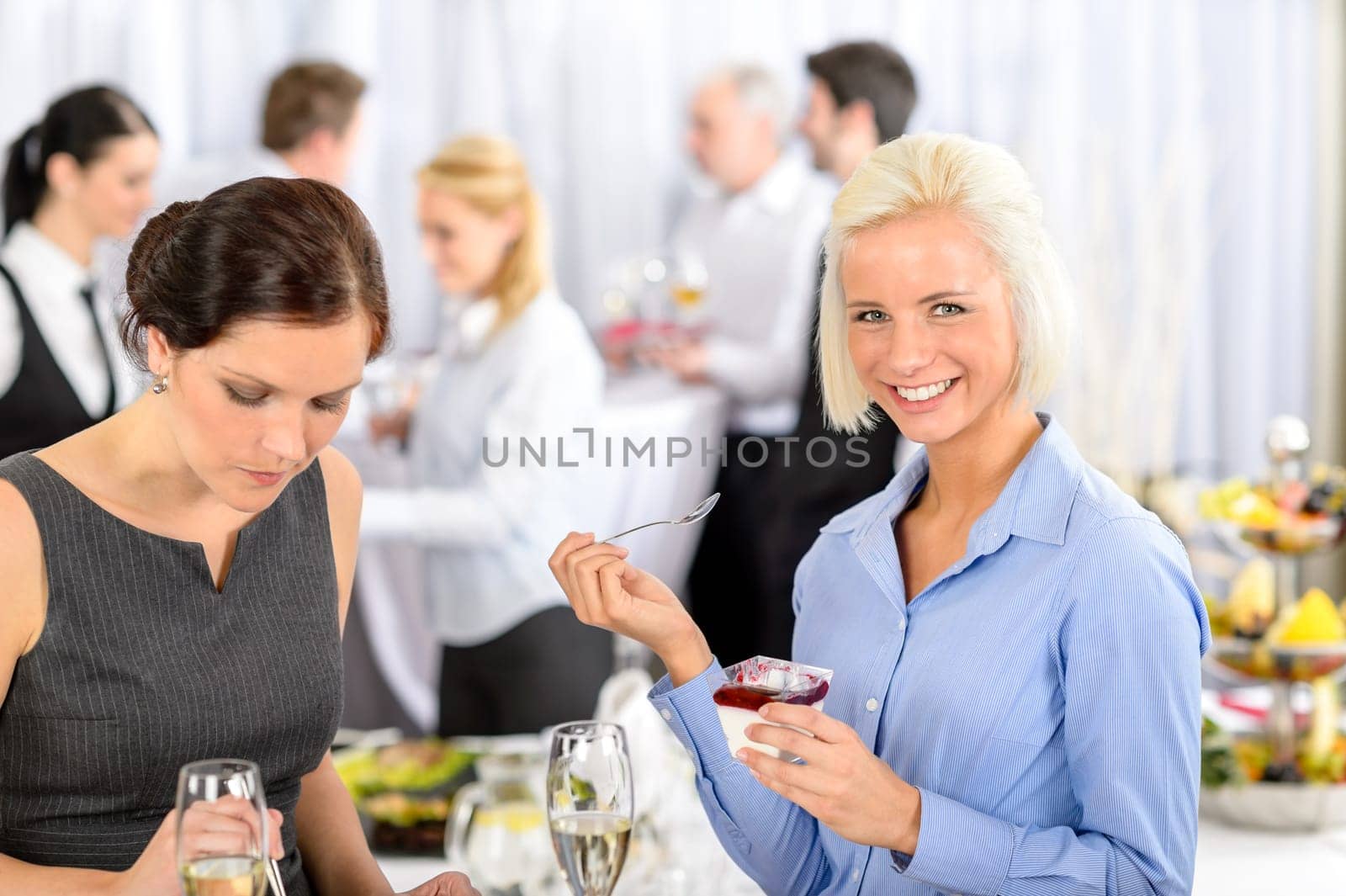 Business meeting buffet smiling woman eat dessert formal company event
