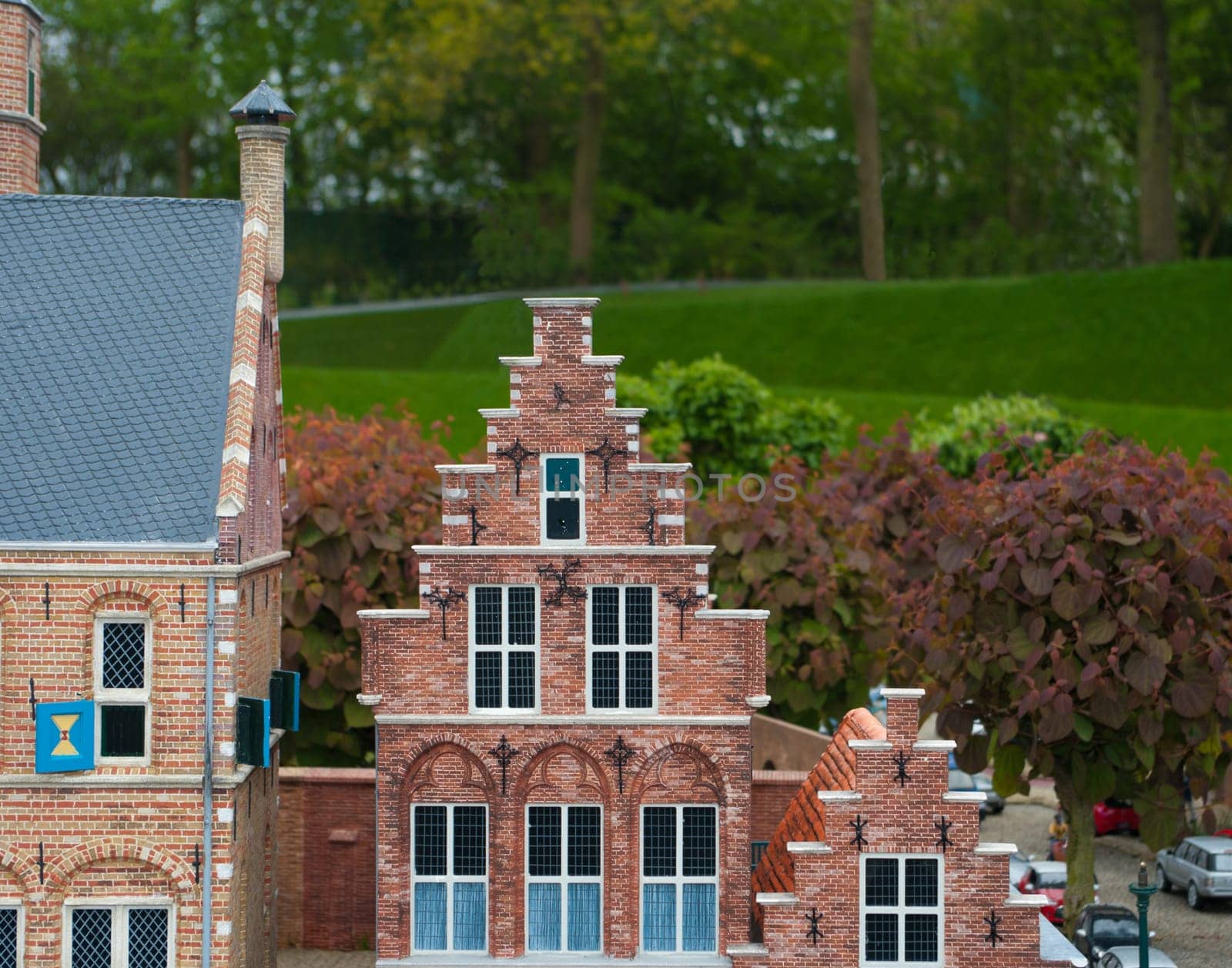 replica of medieval dutch houses as a tourist attraction in Madurodam park in The Hague, Netherlands.