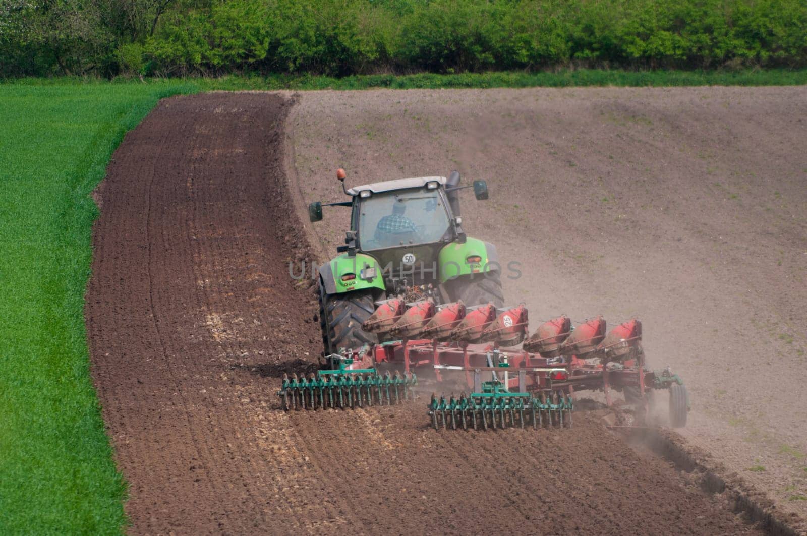 farmer ploughing field in Germany