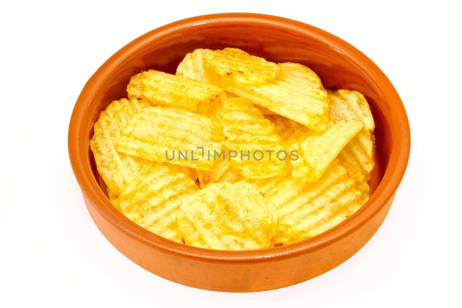 chips in a bowl of mud on a white background