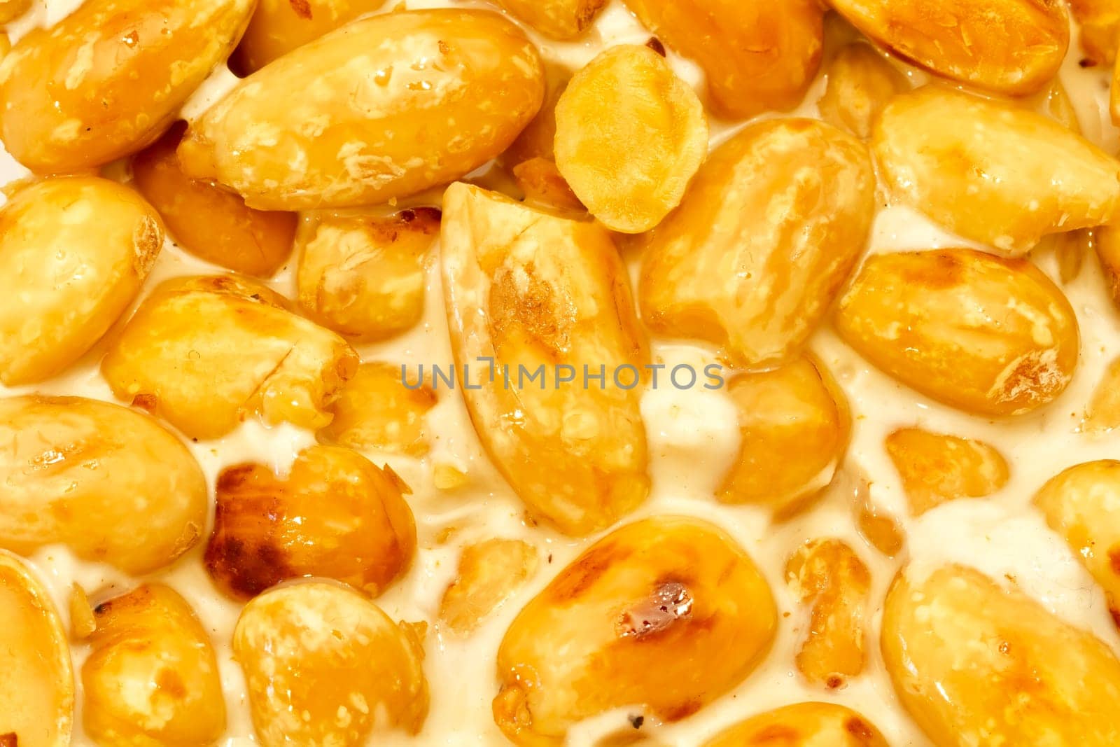 Nougat with almonds on the white