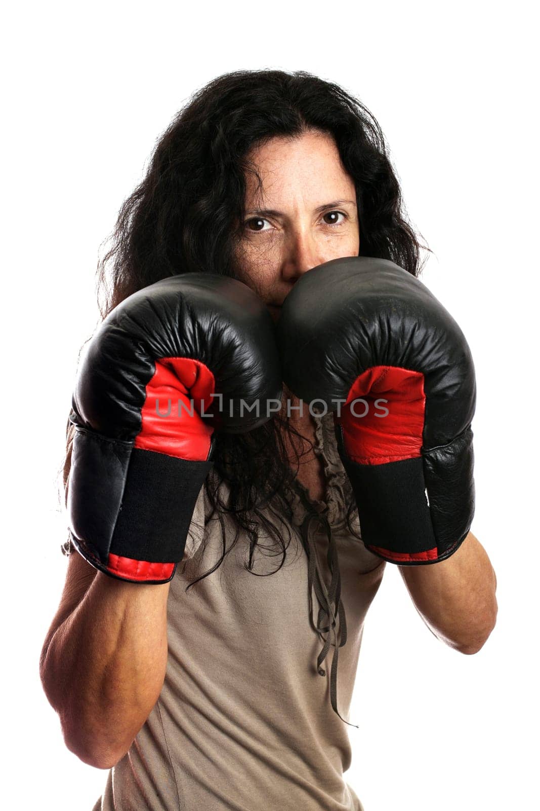 Young girl with boxing glove isolated in white