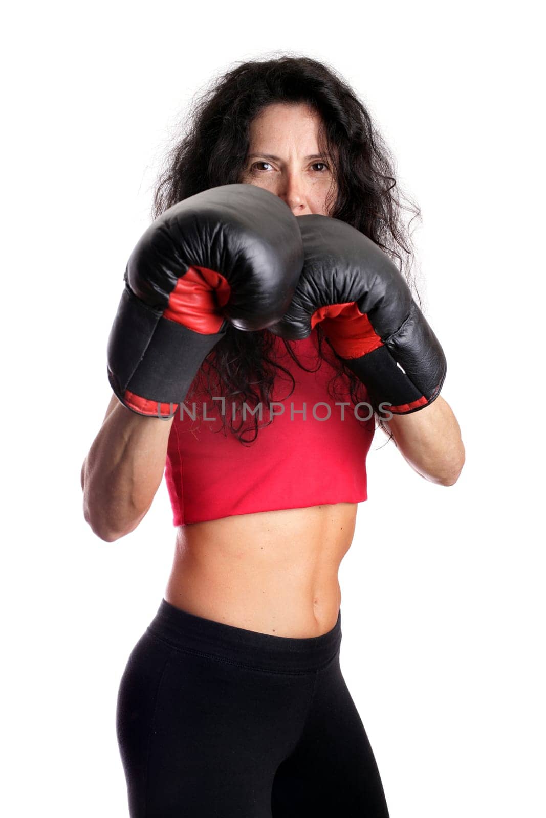 Young girl with boxing glove isolated in white