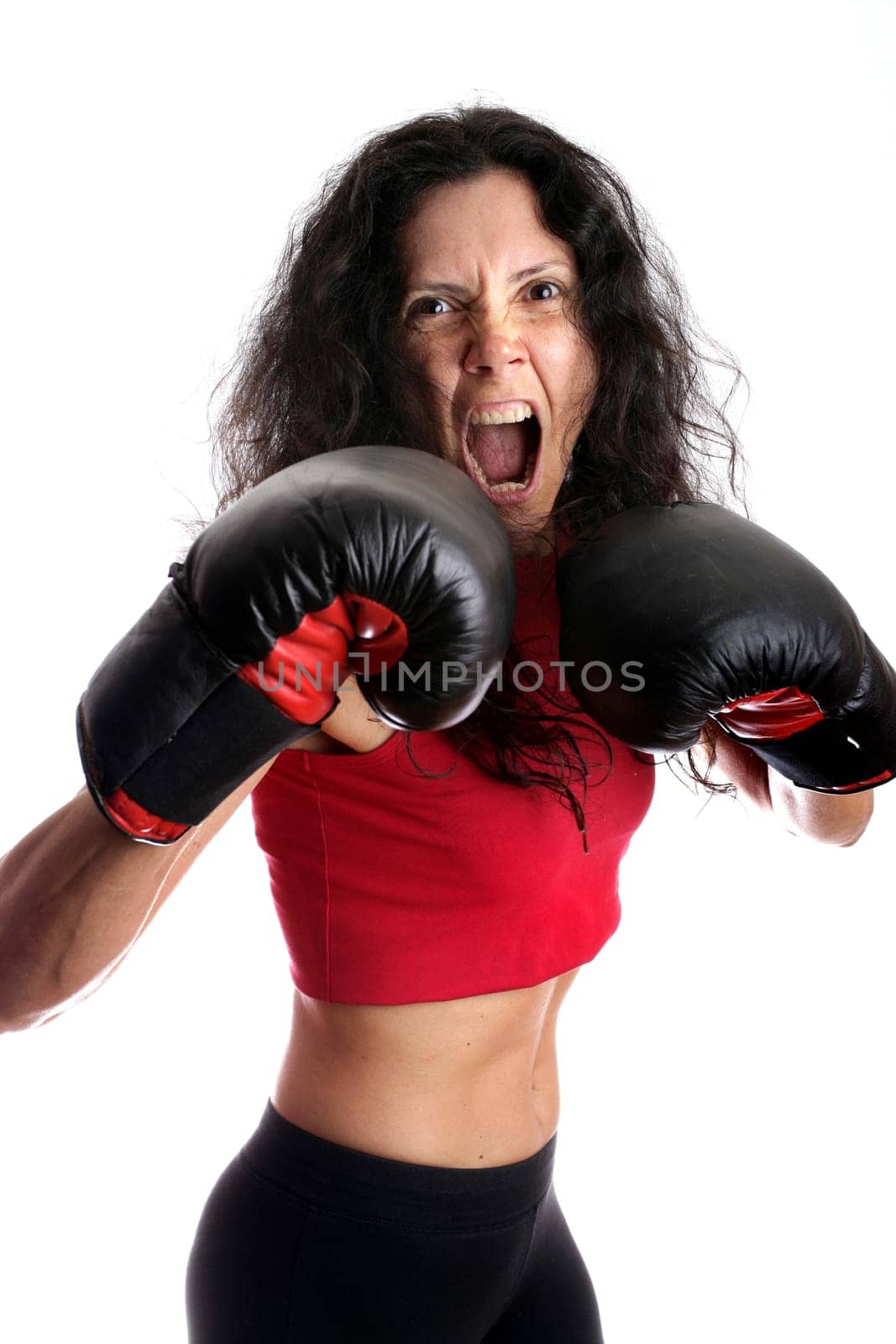 Young girl with boxing glove isolated in white