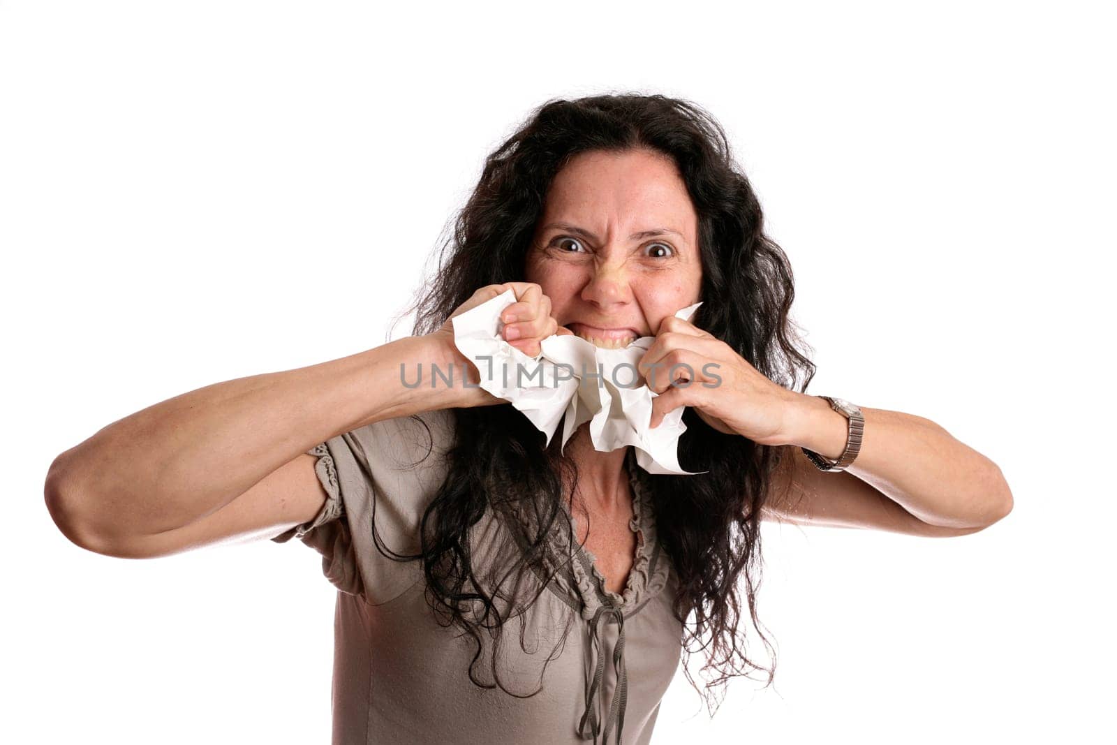 Angry woman eating paper isolated in white