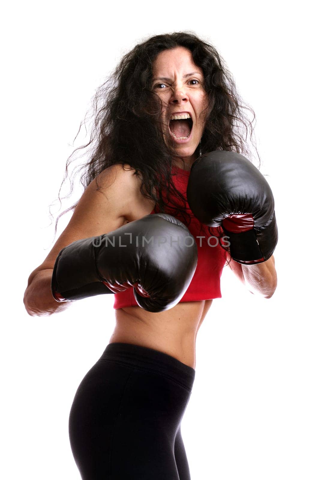 Young girl with boxing glove isolated in white