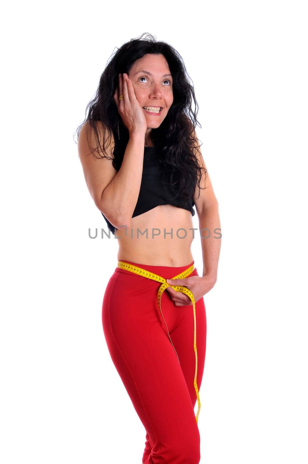 Mature fit woman with measuring tape isolated in white