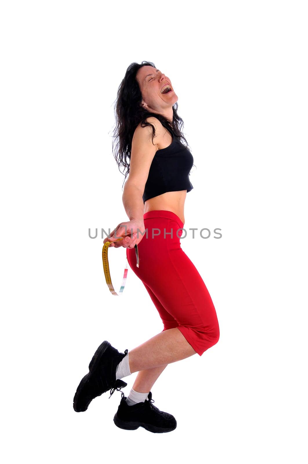 Mature fit woman with measuring tape isolated in white