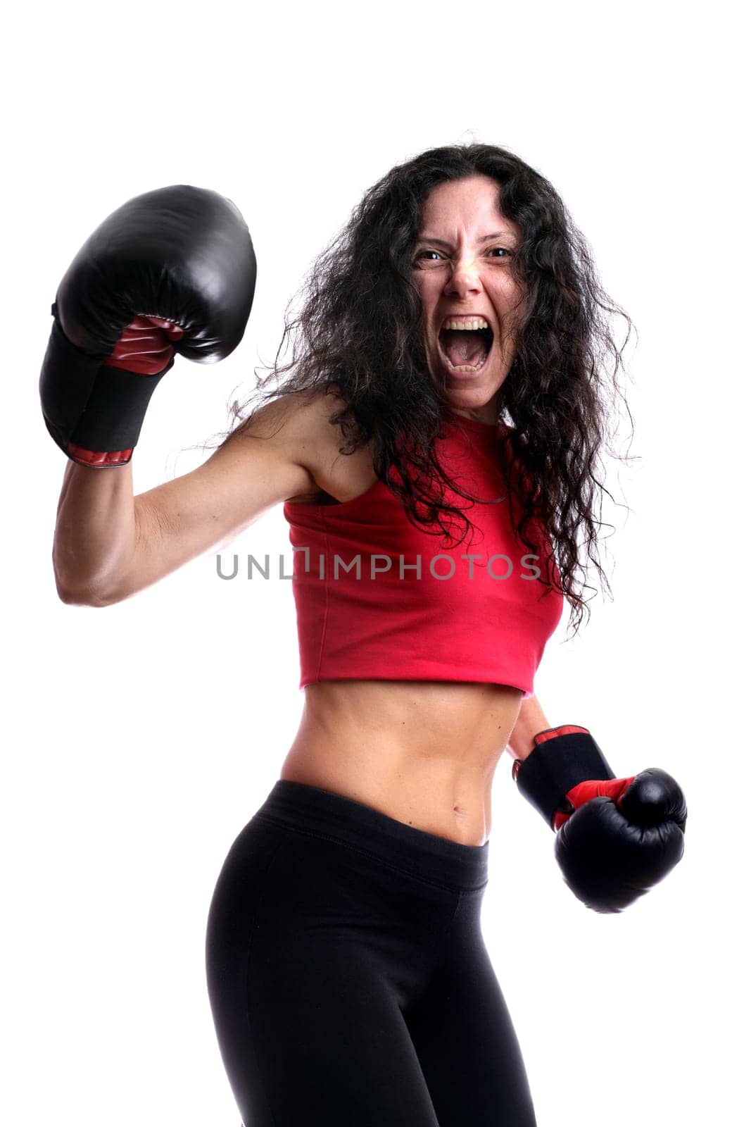 Young girl with boxing glove isolated in white