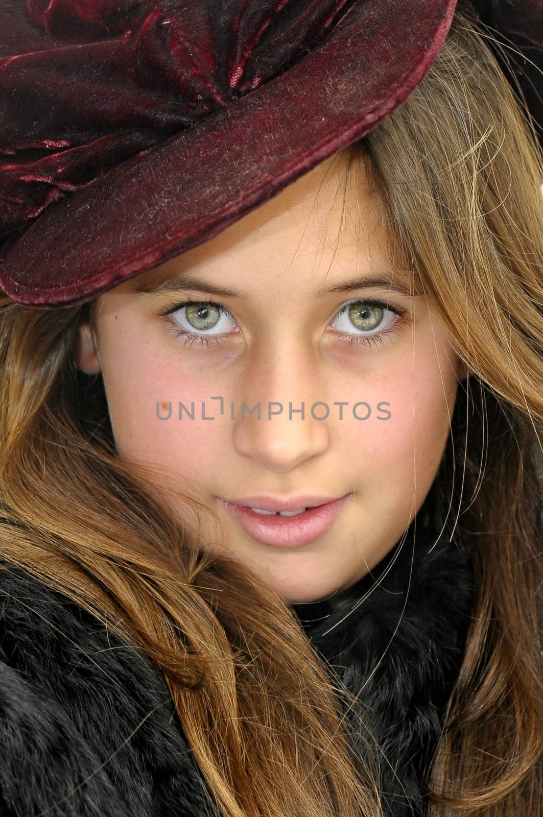 Beautiful girl with hat isolated in white