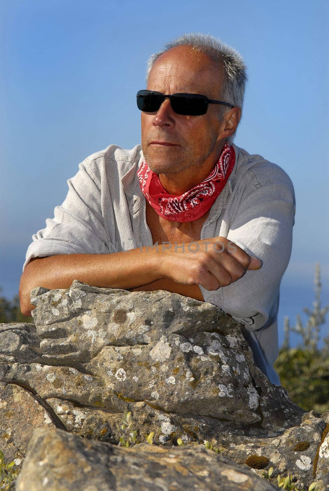 Hansome mature man model posing outdoors
