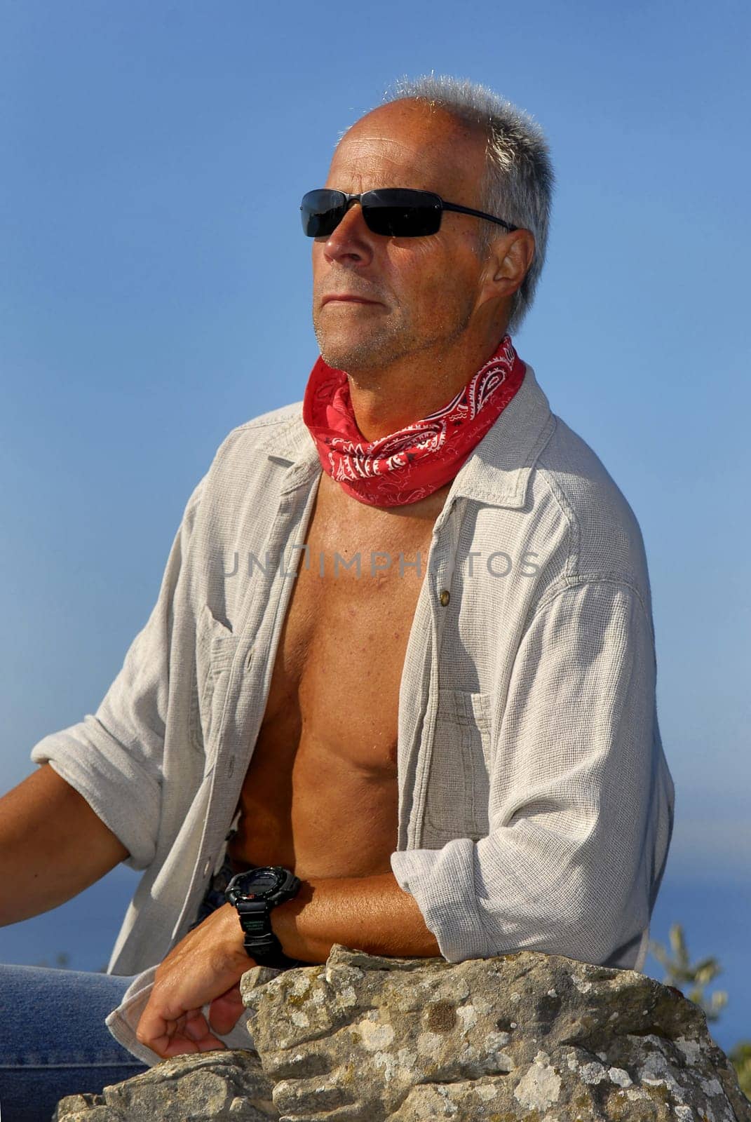 Handsome mature man posing outdoors