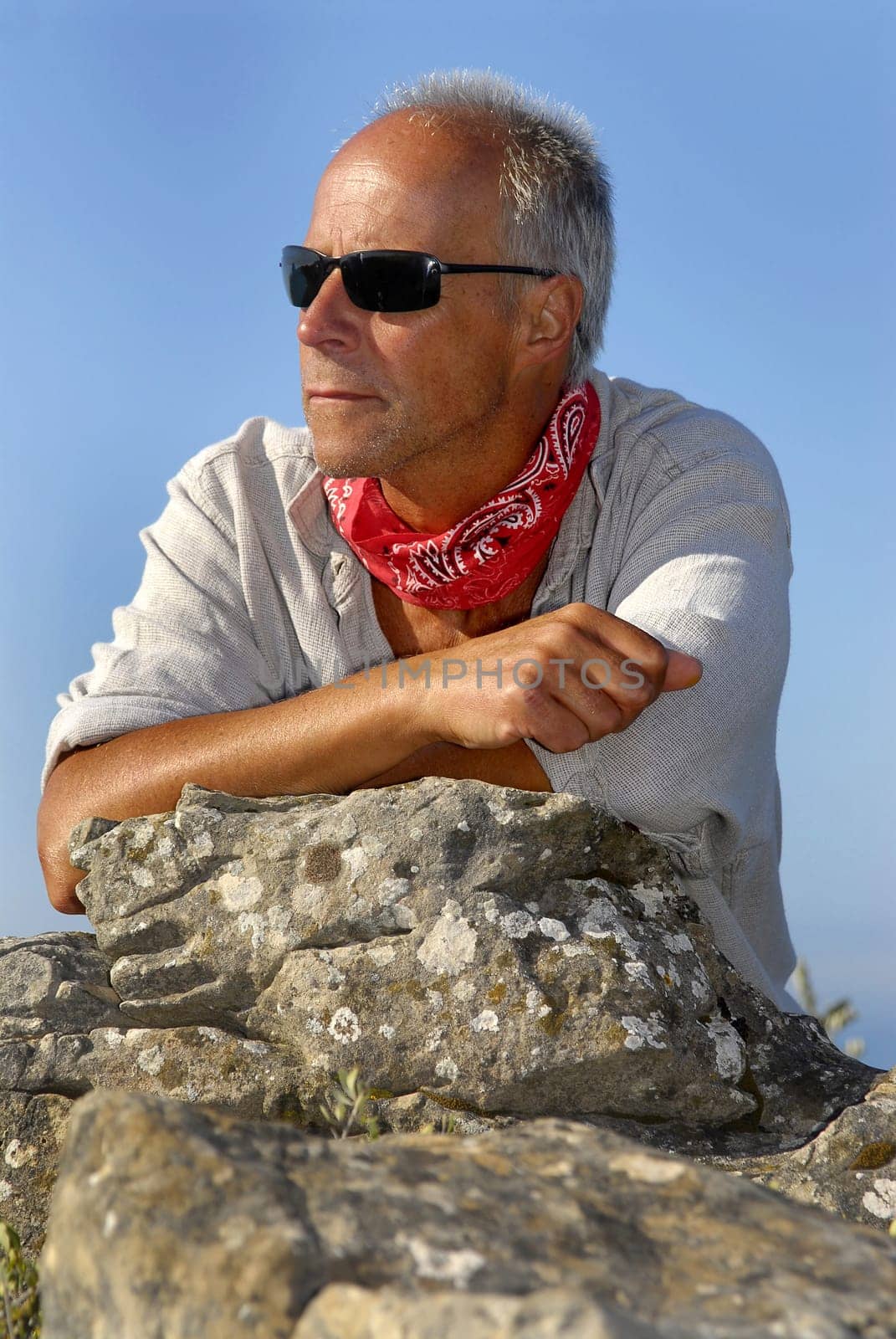 Handsome mature man model posing otdoors
