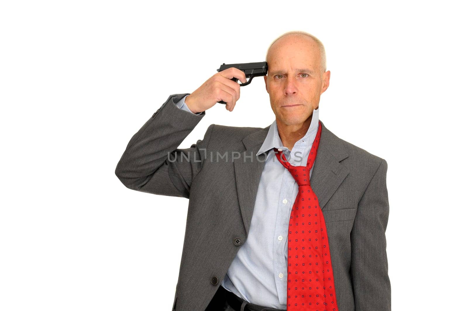 Mature man with a gun isolated in white