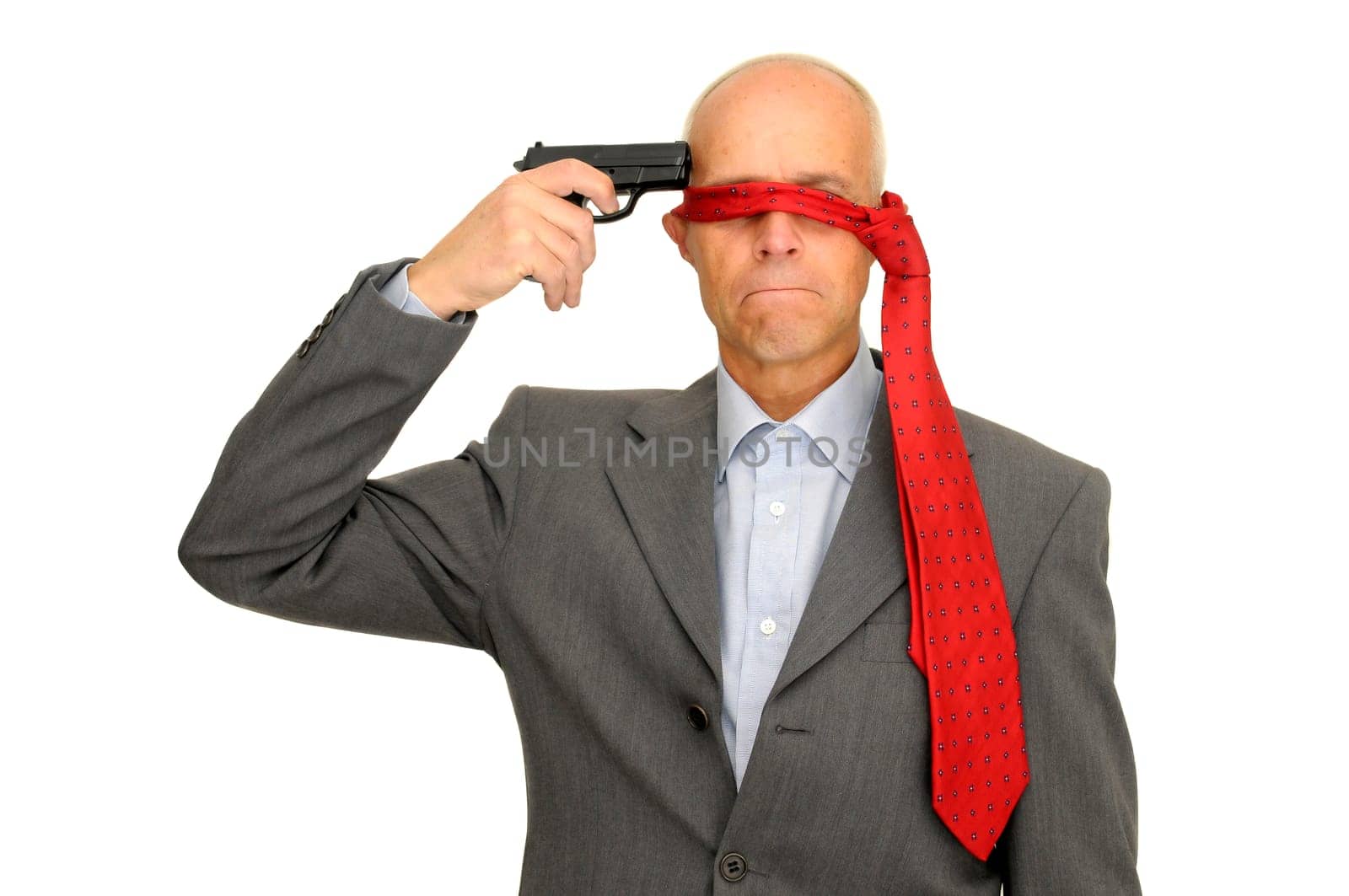 Mature man with a gun isolated in white