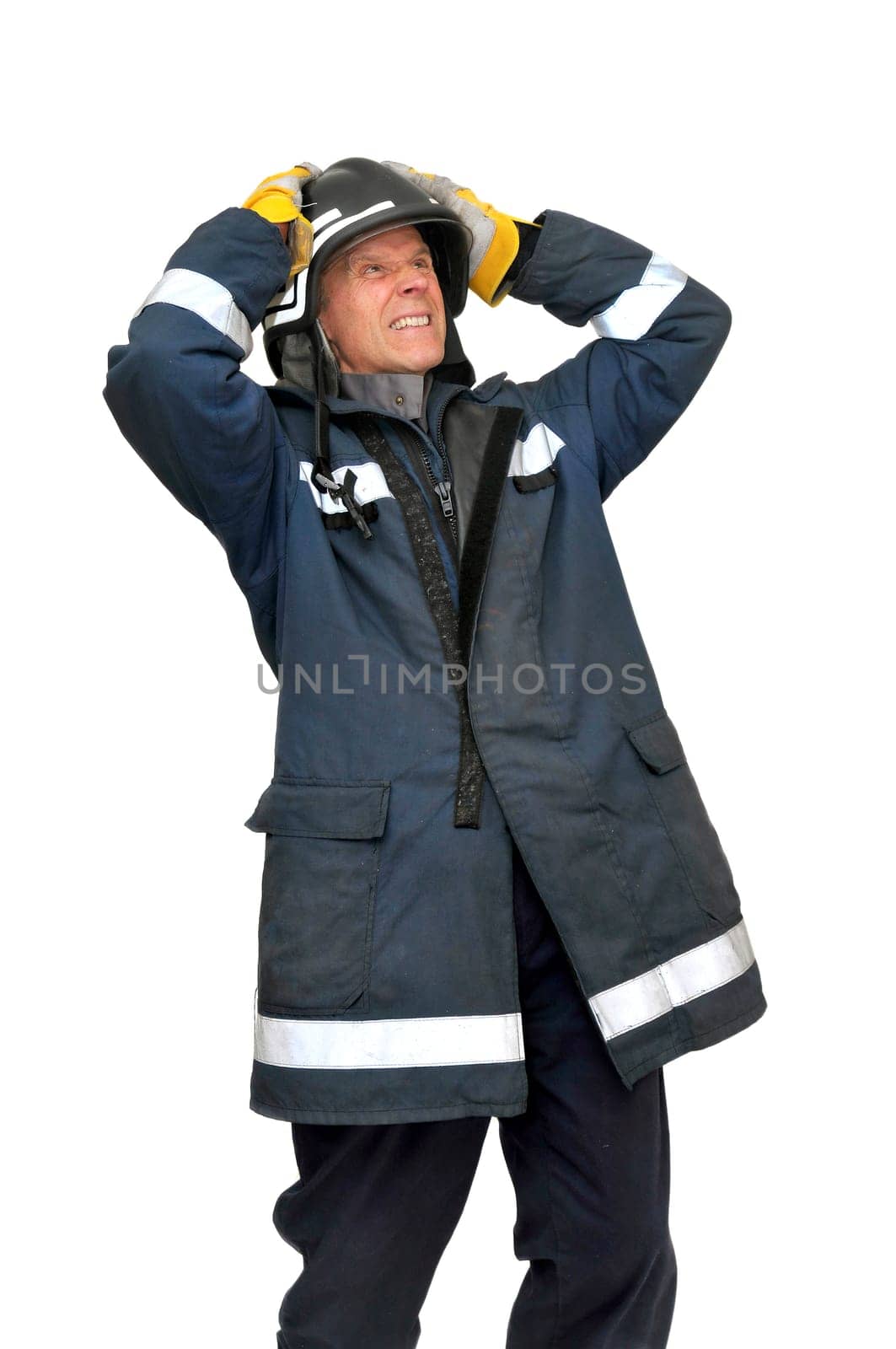 Fireman in uniform isolated in white