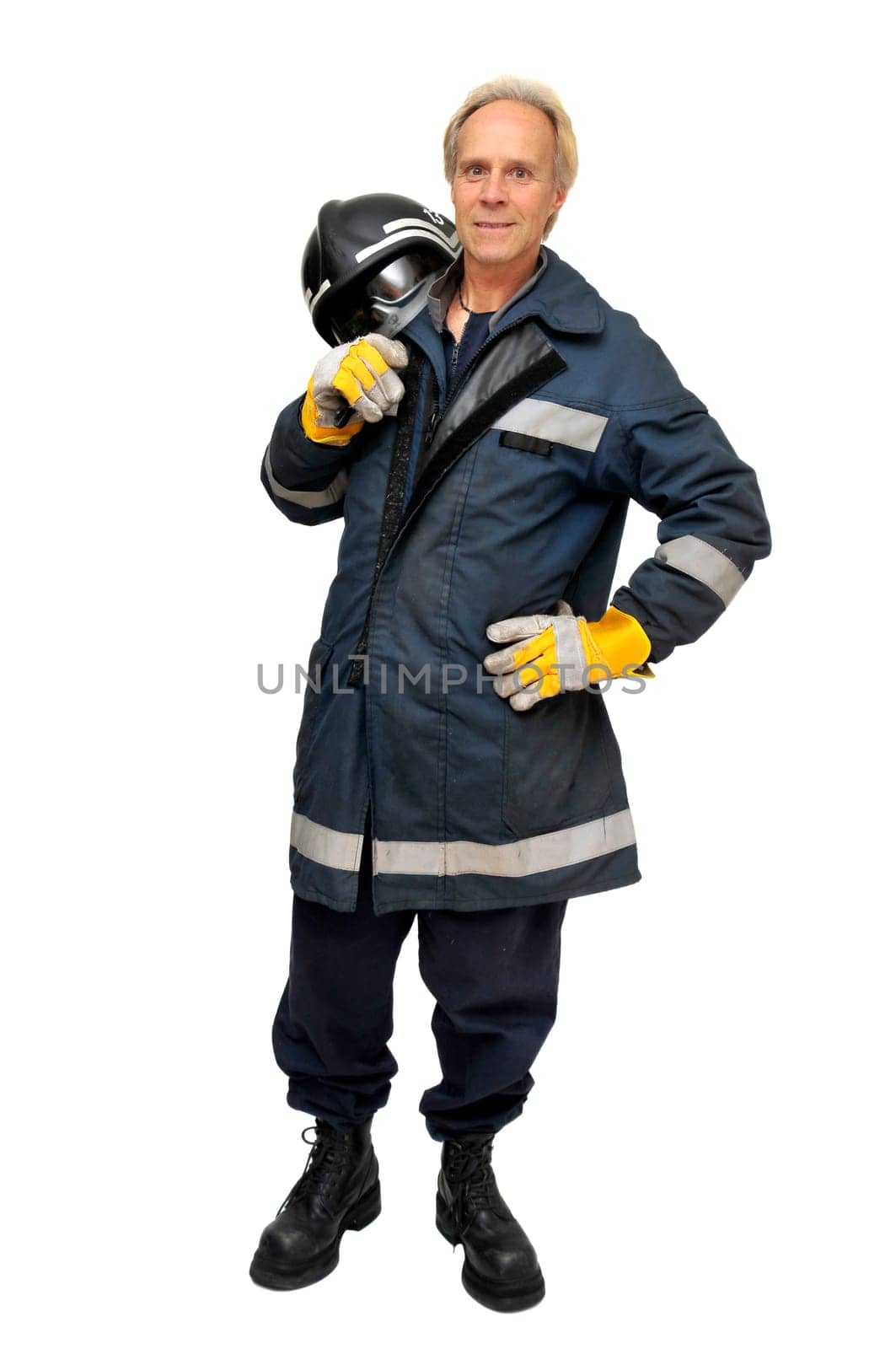 Fireman in uniform isolated in white