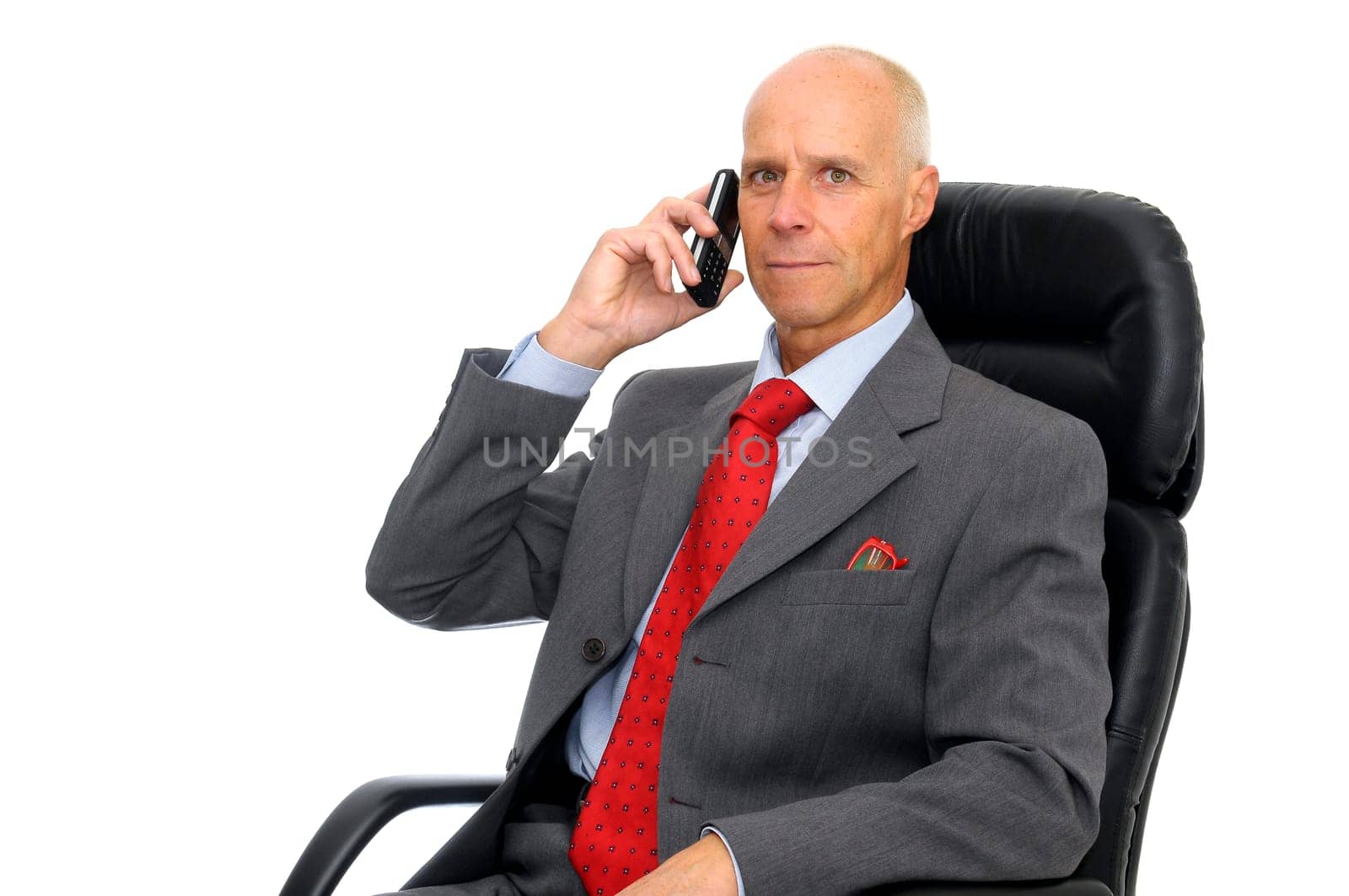 Mature man with cellphone isolated in white