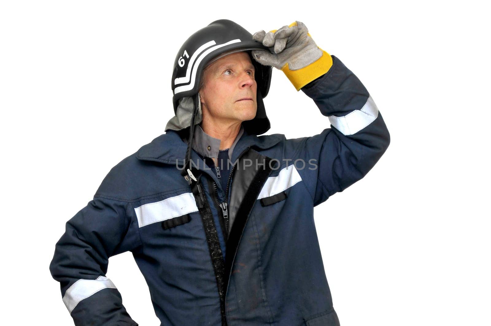 Fireman in uniform isolated in white