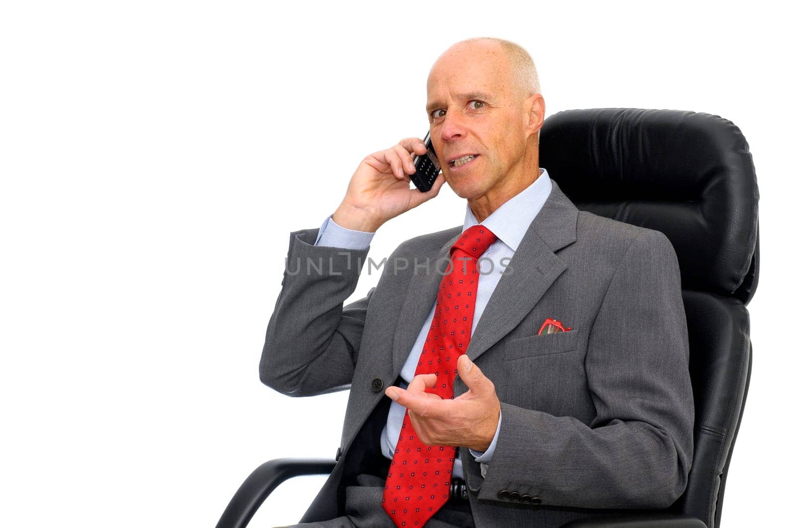 Mature man with cellphone isolated in white