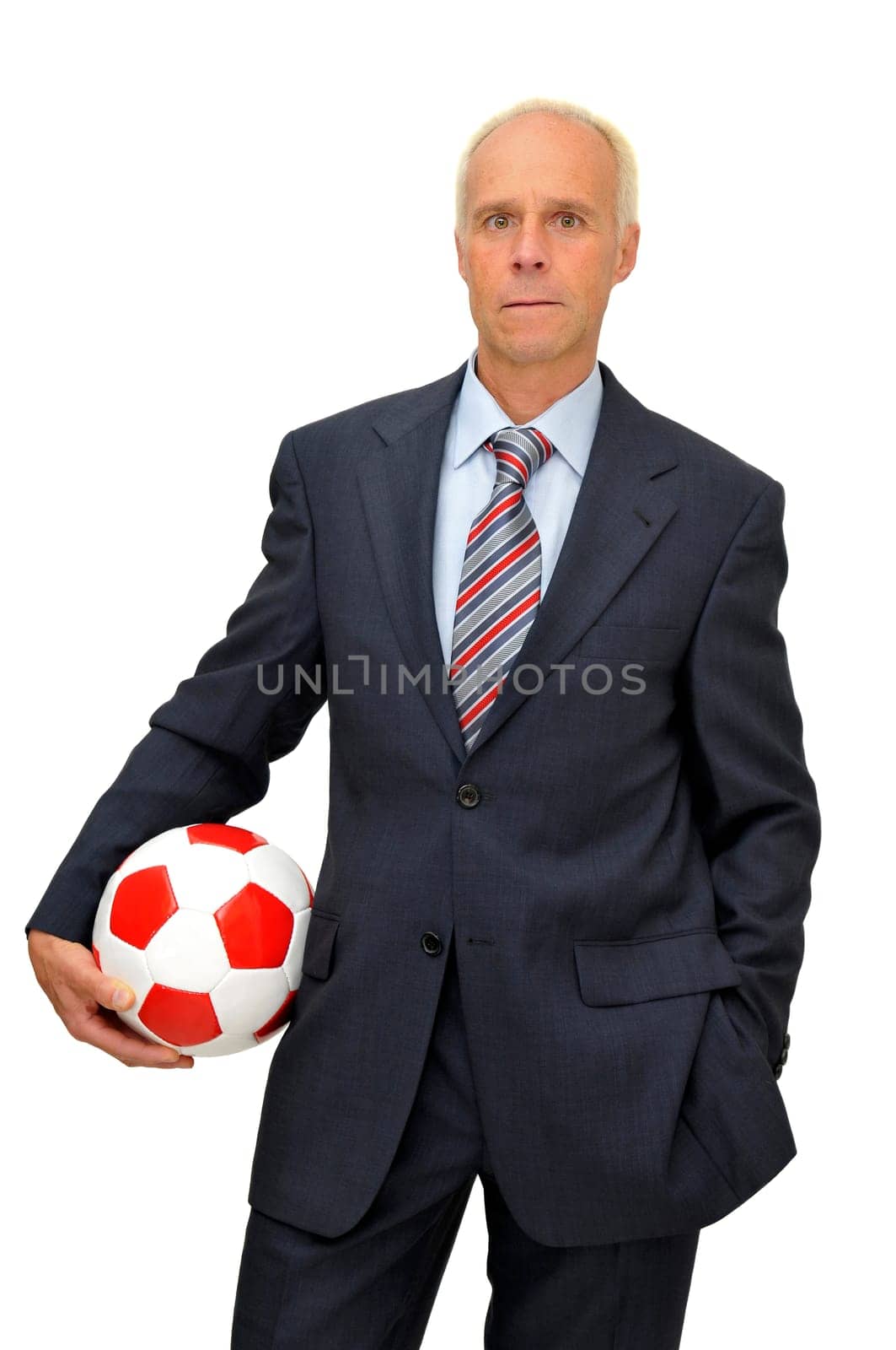 Businessman with soccer ball isolated in white