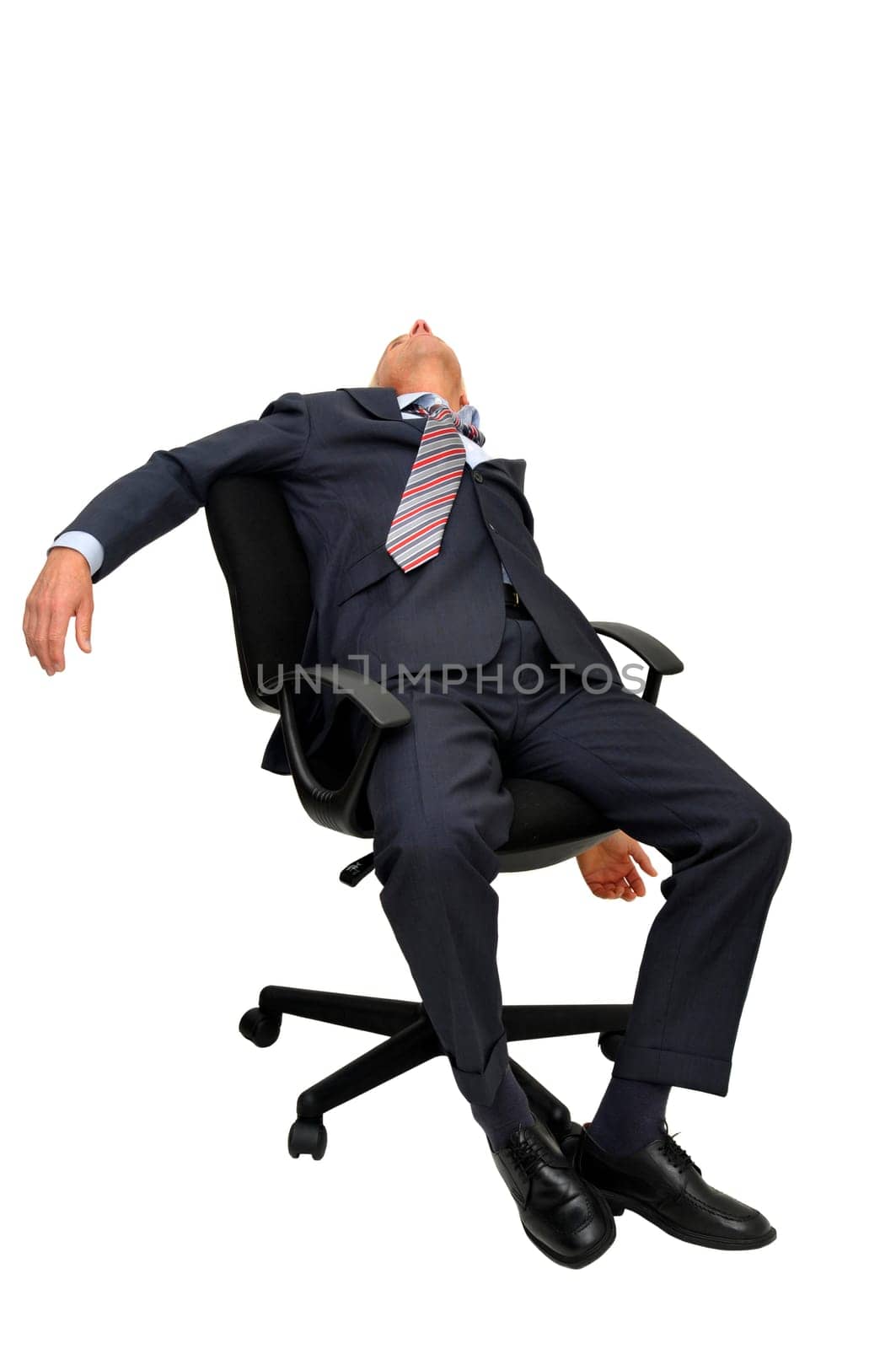Mature businessman in a chair isolated in white