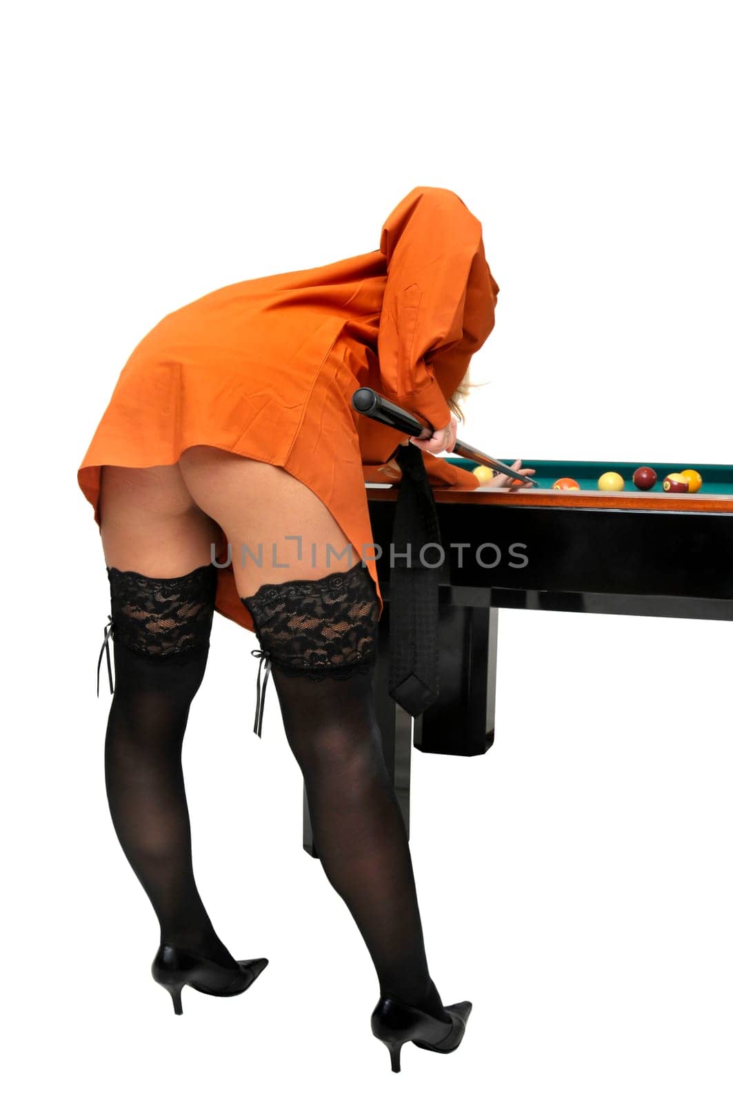 Sexy girl with man's shirt and tie playing snooker