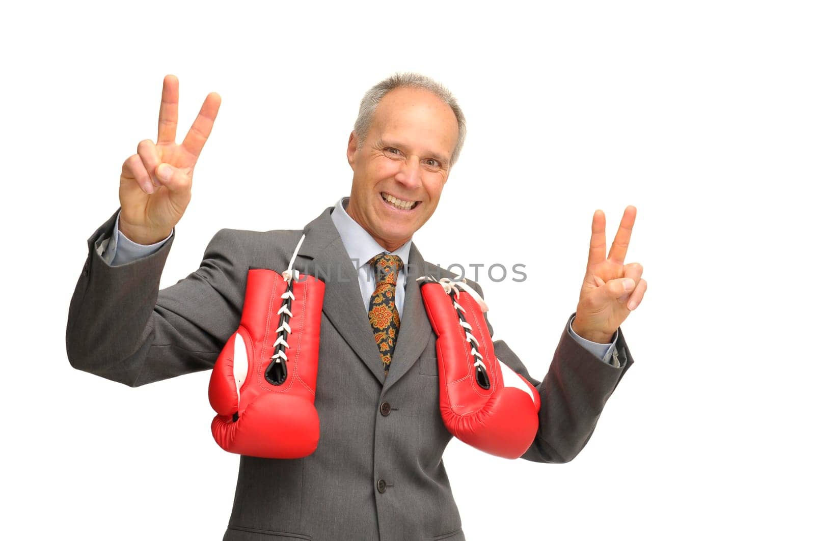 Businessman with boxing gloves isolated against a white background